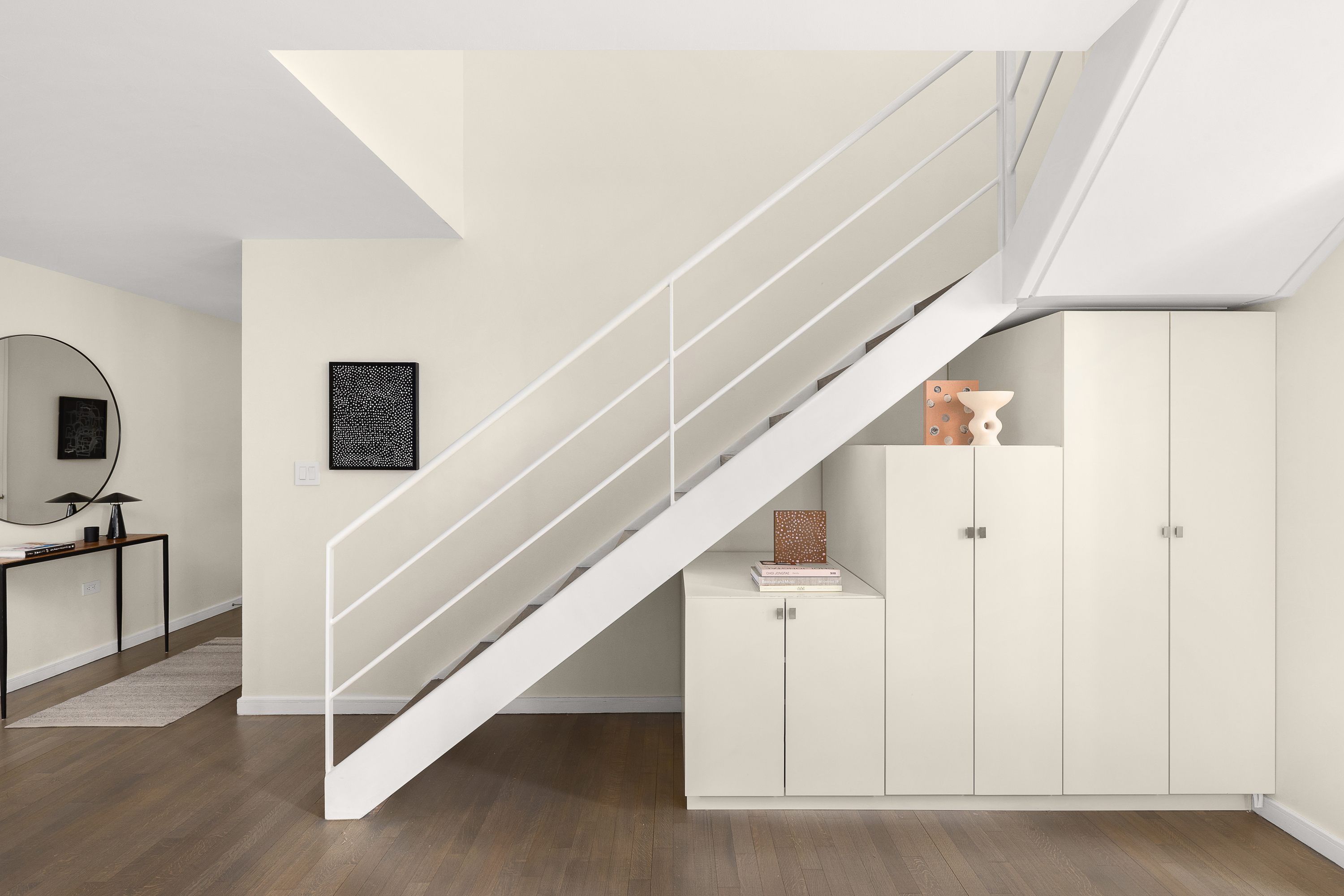 310 East 53rd Street, Unit 2/3D Manhattan, NY 10022 - Photo 8 of 13 a view of entryway and hall with wooden floor