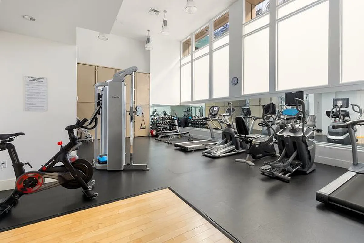 51 Walker Street, Unit 8B Manhattan, NY 10013 - Photo 15 of 16 a view of a room with gym equipment