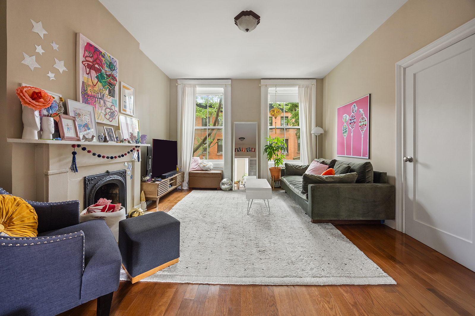 54 Cheever Place Brooklyn, NY 11231 - Photo 15 of 25 a living room with furniture and a fireplace