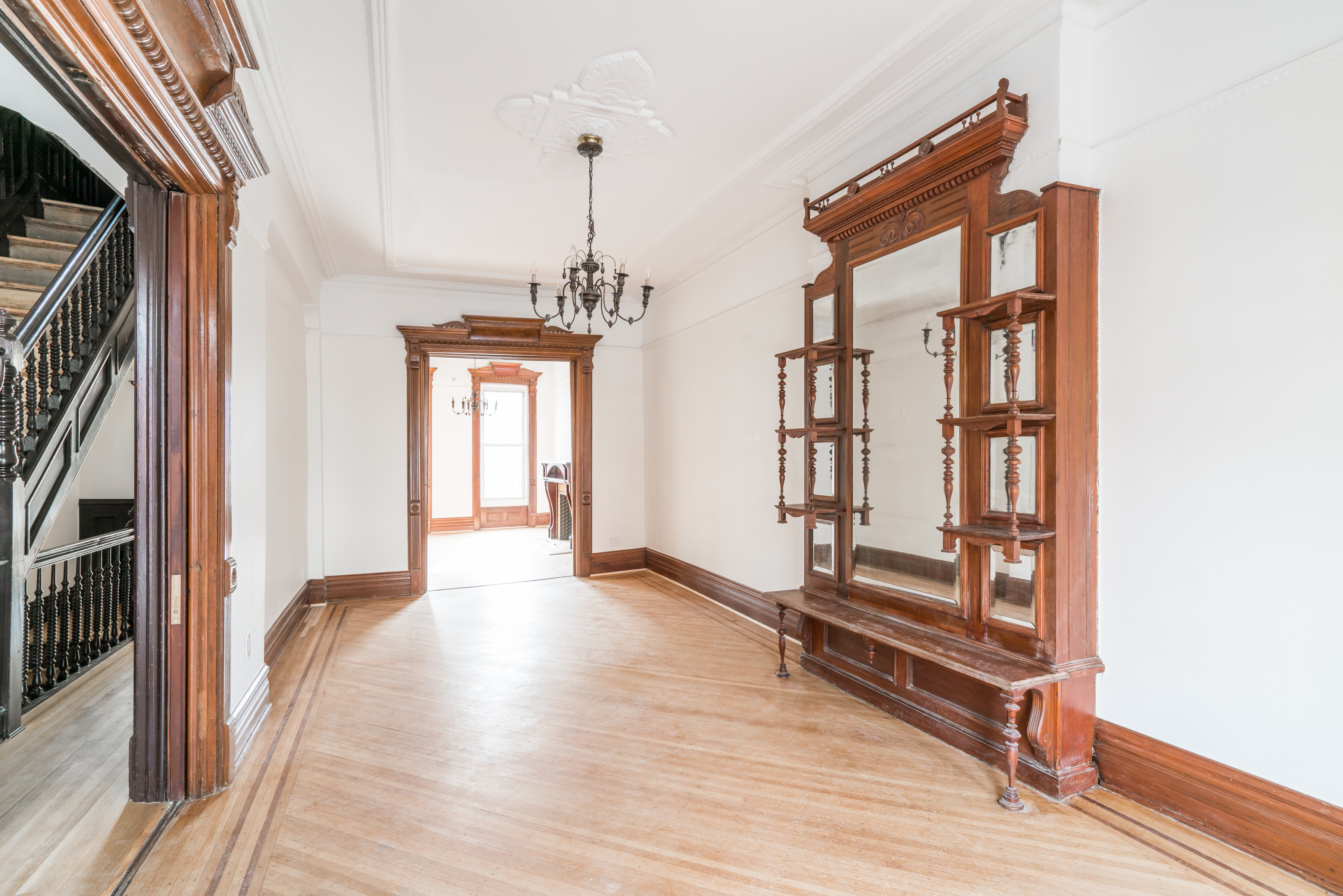 670 Macon Street, Unit 2 Brooklyn, NY 11233 - Photo 2 of 16 a view of a hallway with wooden floor and entryway