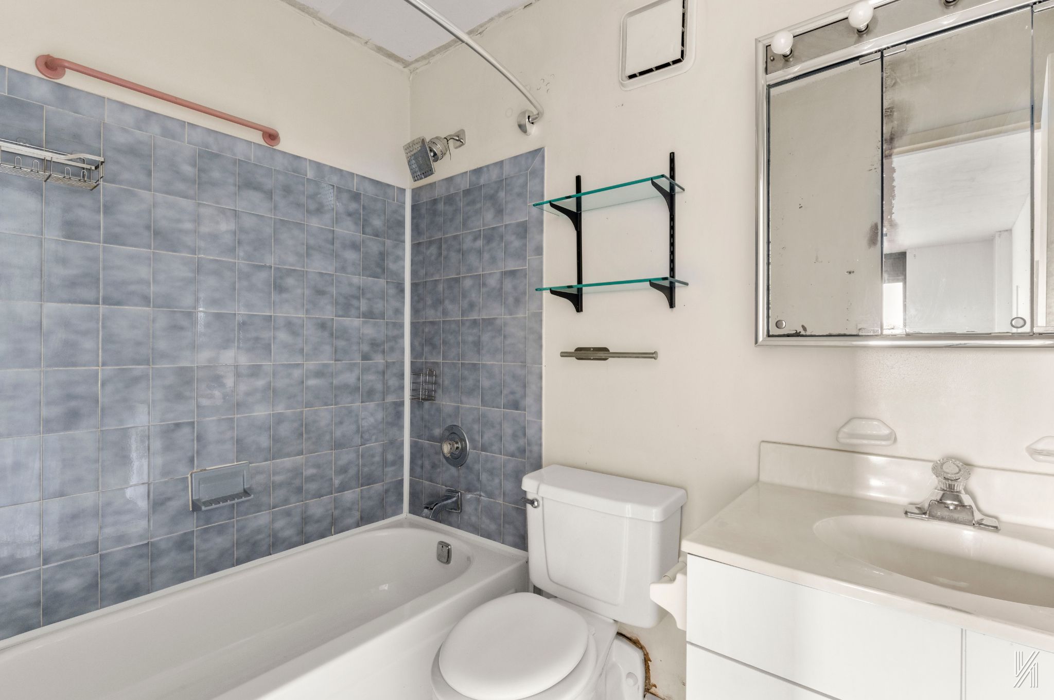 25-40 Shore Boulevard, Unit 4R Queens, NY 11102 - Photo 7 of 11 a bathroom with a sink toilet and shower