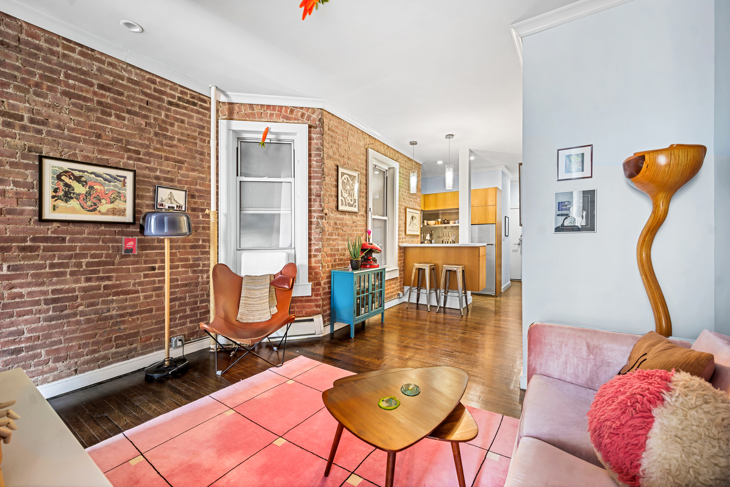 330 West 17th Street, Unit 3E Manhattan, NY 10011 - Photo 2 of 8 a bedroom with furniture and a rug