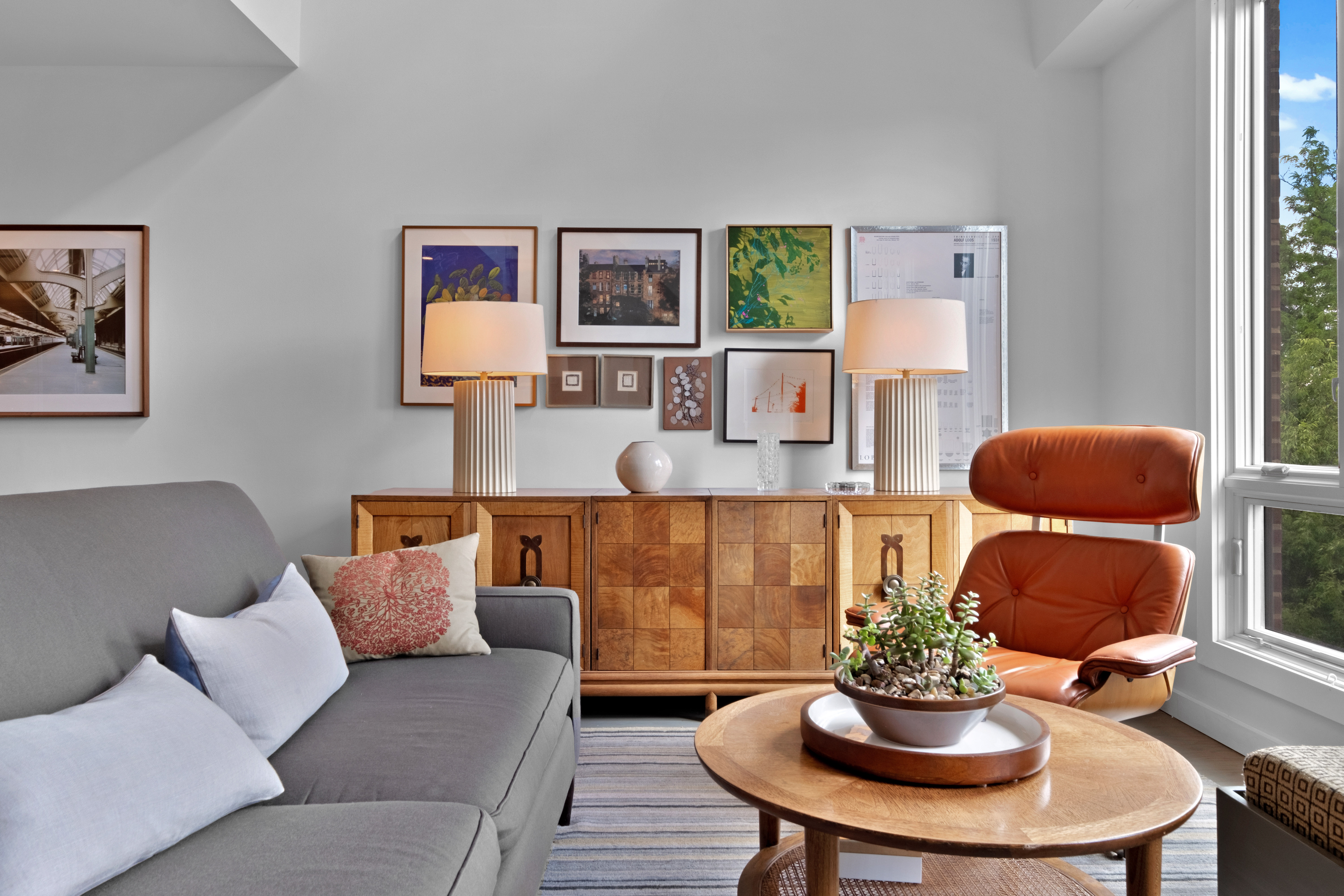 256 1/2 South 3rd Street Philadelphia, PA 19106 - Photo 6 of 73 a living room with furniture and a dining table with wooden floor