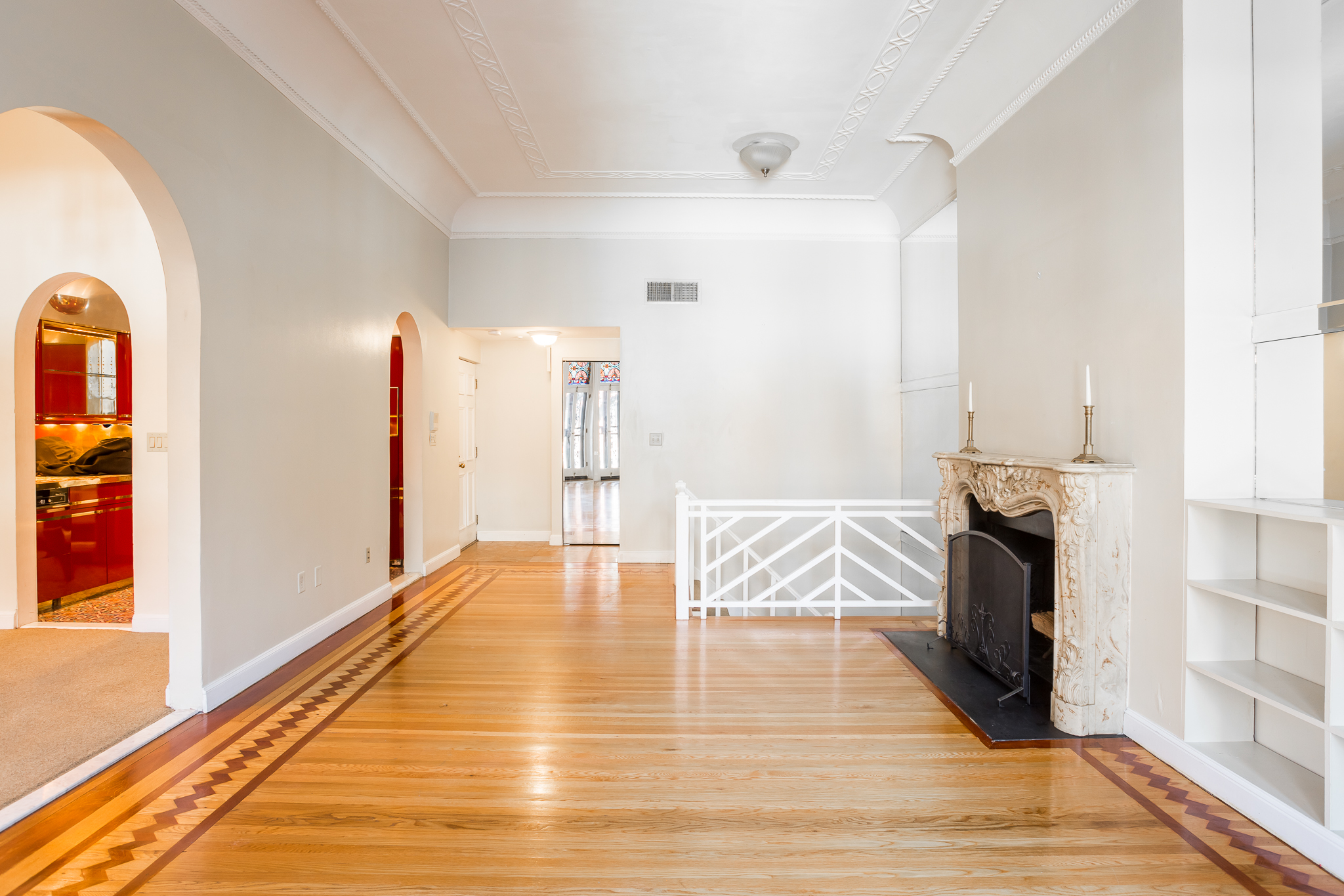 327 Commonwealth Avenue Boston, MA 02115 - Photo 3 of 26 a view of empty room with wooden floor and fan