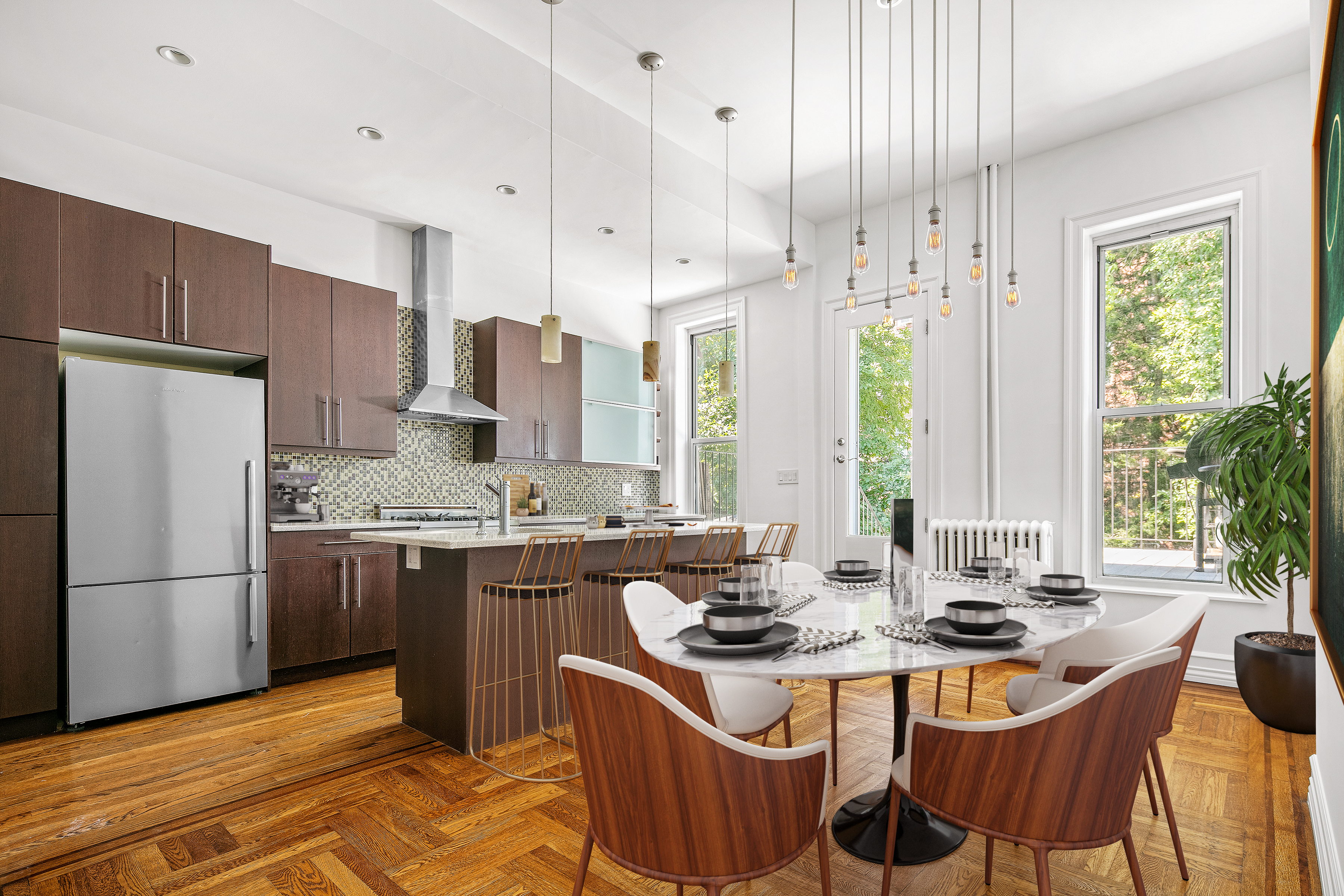 428 5th Street Brooklyn, NY 11215 - Photo 4 of 26 a kitchen with stainless steel appliances granite countertop a sink stove and refrigerator