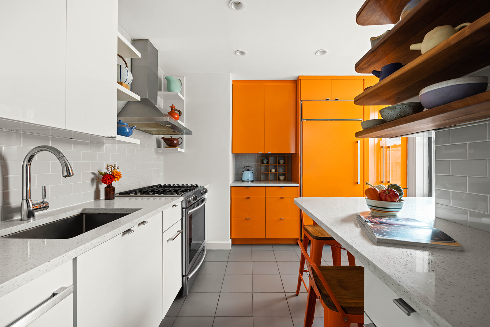 100 Ocean Parkway, Unit 3H Brooklyn, NY 11218 - Photo 2 of 11 a kitchen with stainless steel appliances a sink a stove and a refrigerator