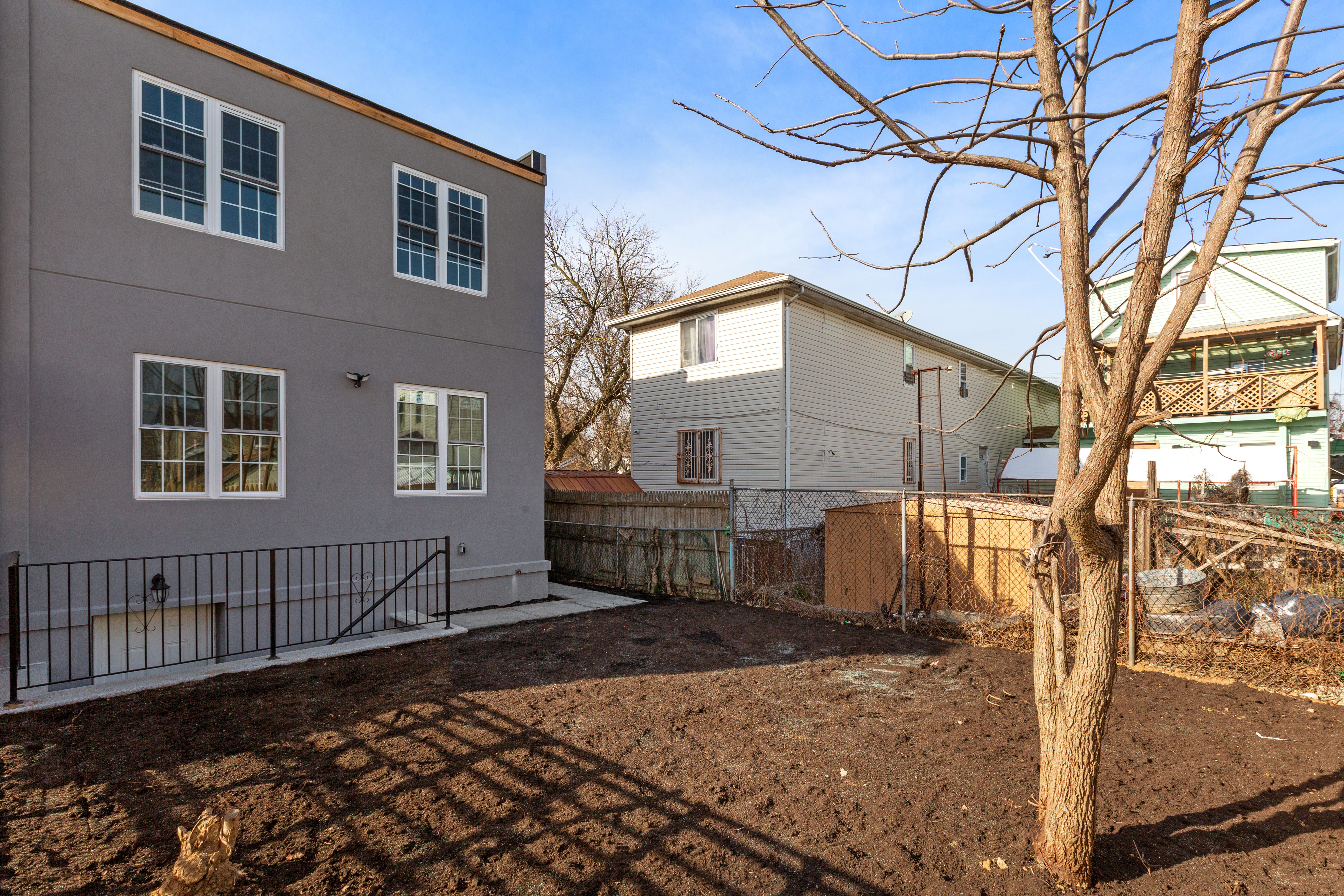 143-10 Shore Avenue Queens, NY 11435 - Photo 30 of 30 a front view of a house with a yard