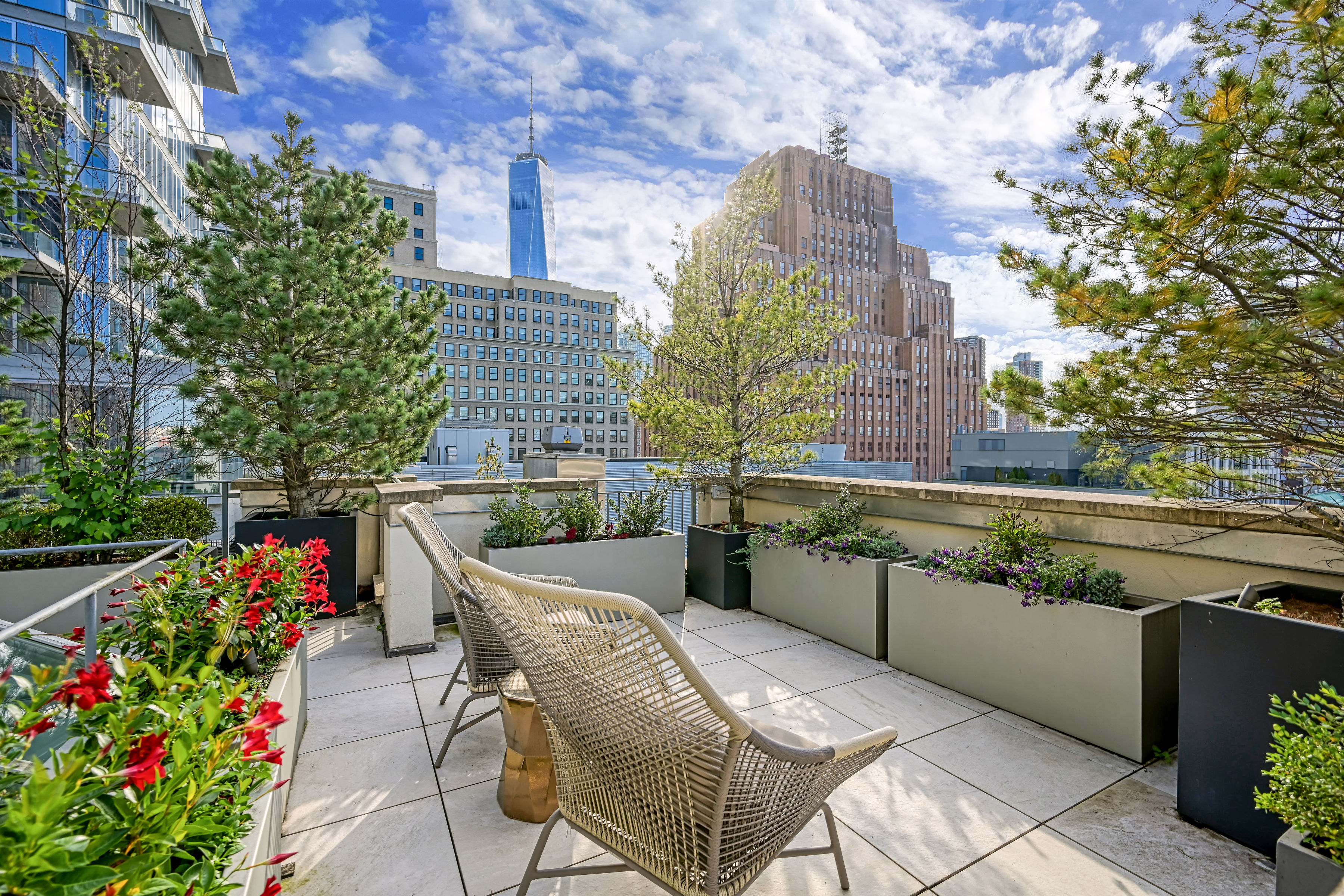 53 Leonard Street, Unit PH Manhattan, NY 10013 - Photo 19 of 24 a view of a chairs and table in the balcony