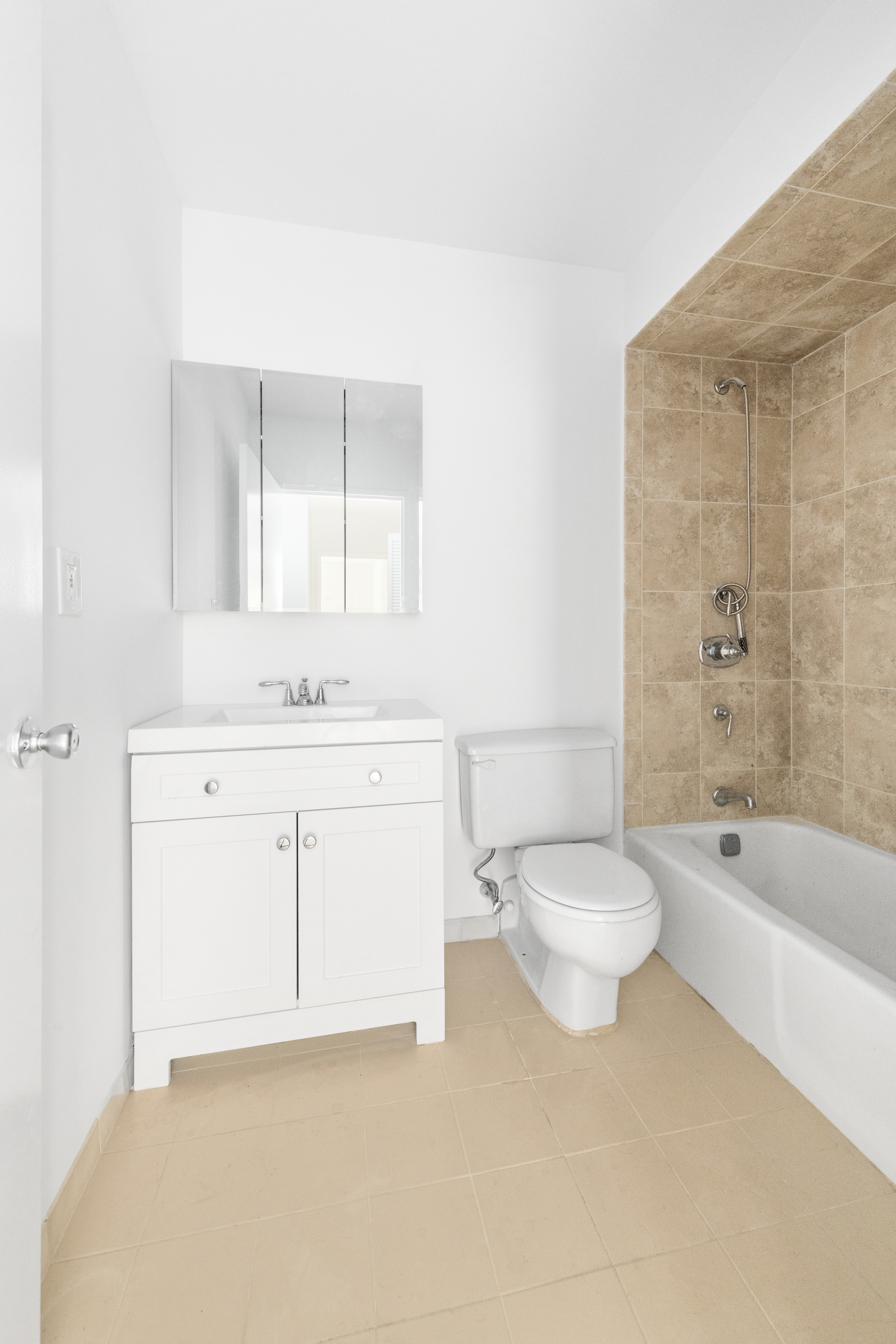 100 West 89th Street, Unit 3E Manhattan, NY 10024 - Photo 10 of 19 a bathroom with a sink a toilet and a bathtub