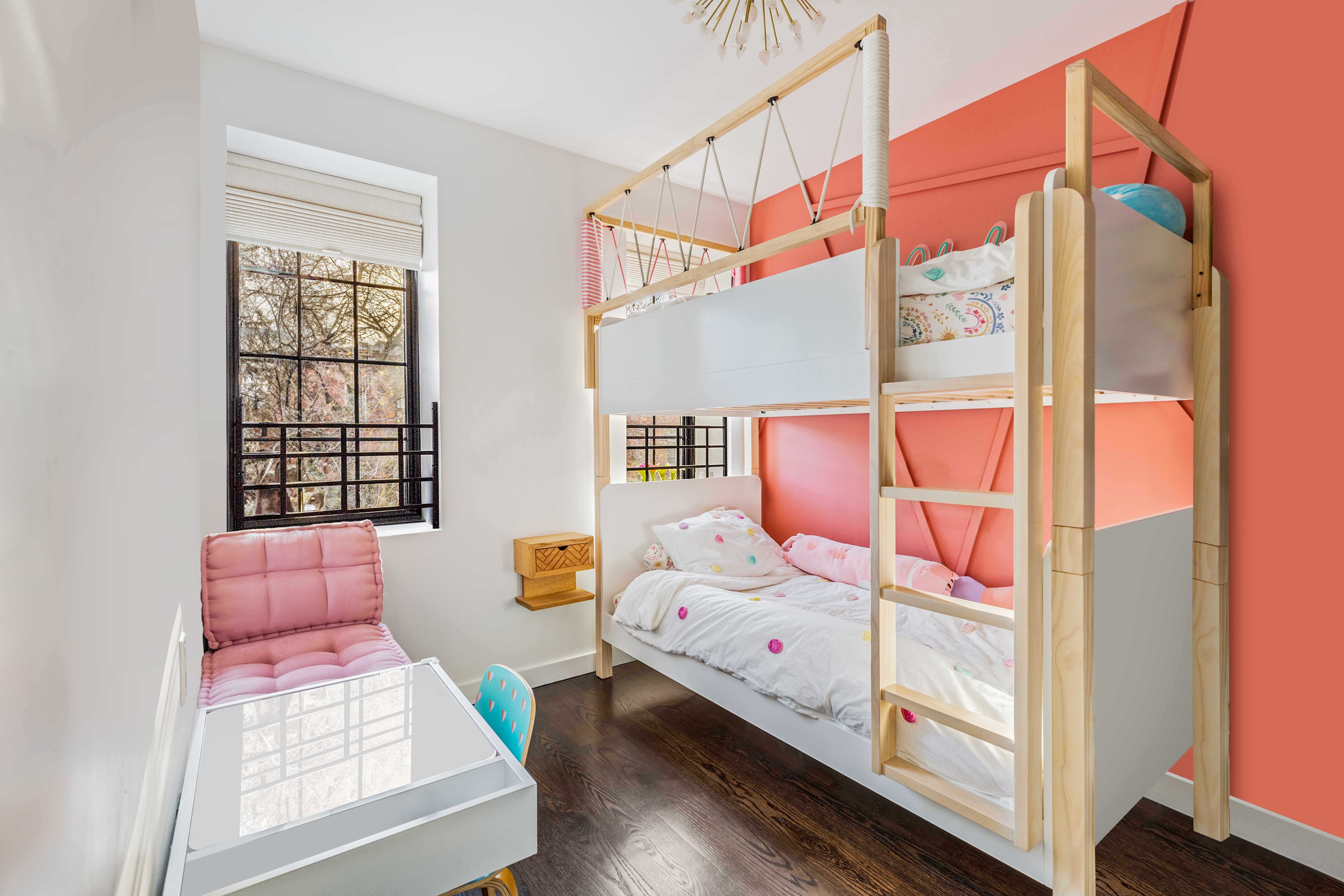 211 14th Street Brooklyn, NY 11215 - Photo 10 of 18 a bedroom with a bed and window