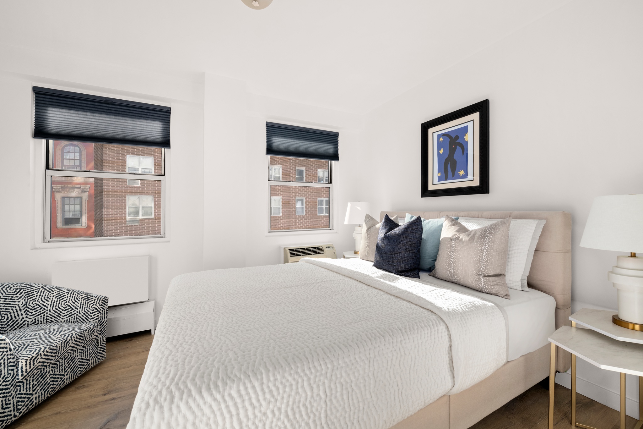 79 West 12th Street, Unit 6BC Manhattan, NY 10011 - Photo 5 of 15 a bedroom with bed and a window