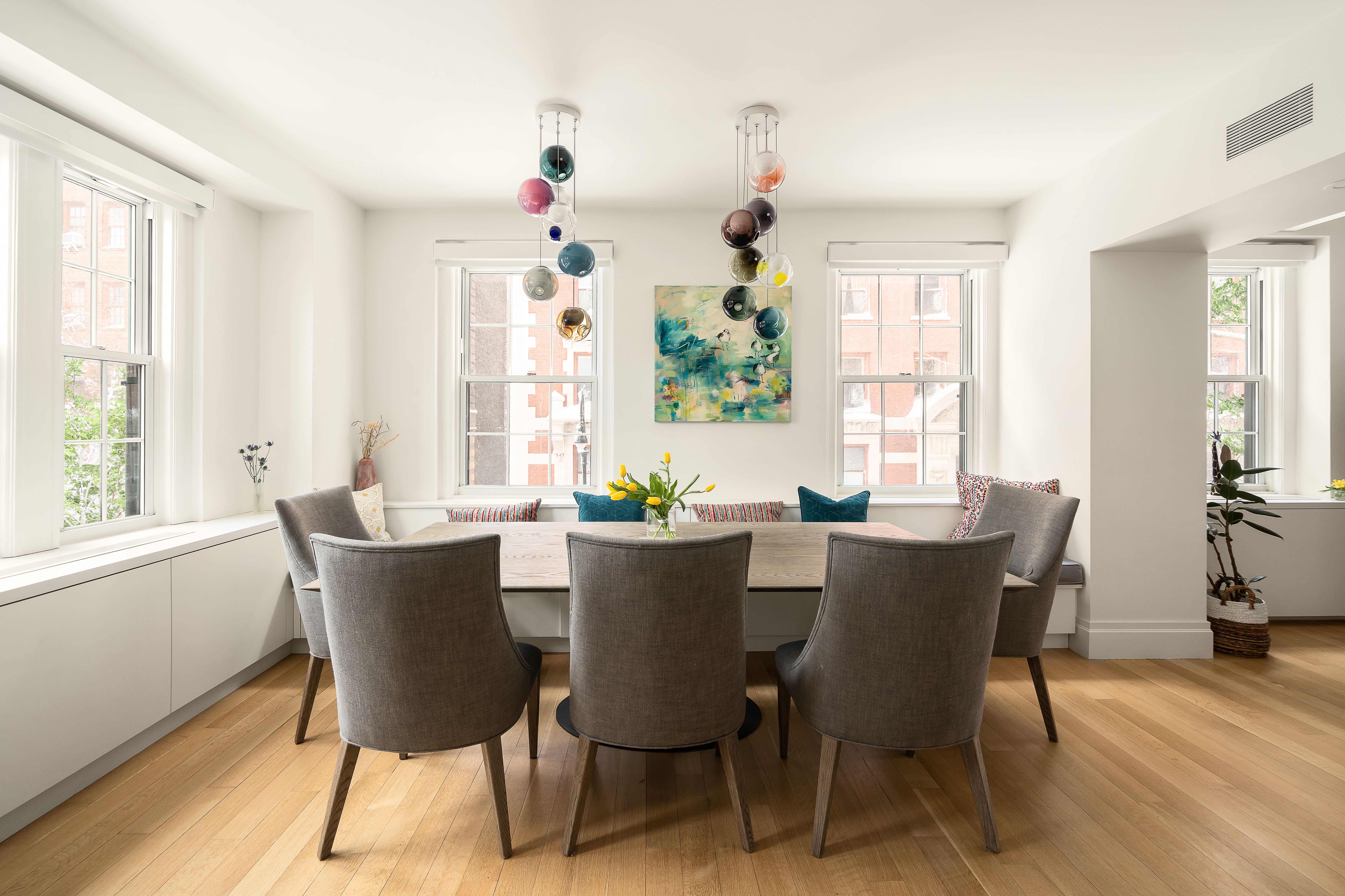 160 Henry Street, Unit 3C Brooklyn, NY 11201 - Photo 6 of 18 a dining room with furniture a chandelier and wooden floor