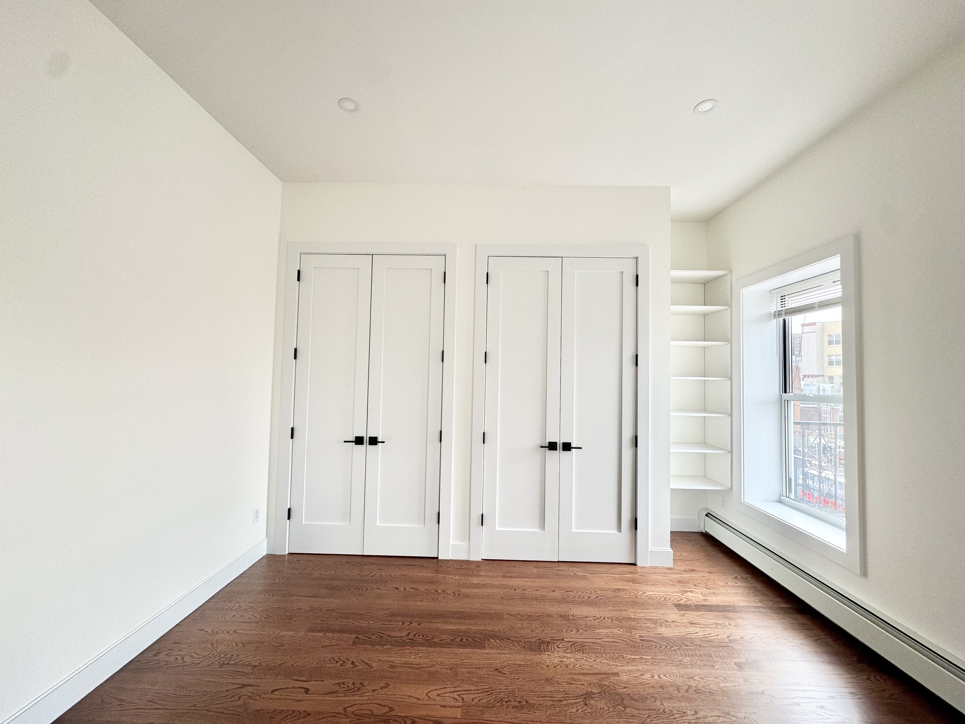 383 Myrtle Avenue, Unit 3 Brooklyn, NY 11205 - Photo 18 of 21 a view of a livingroom with wooden floor