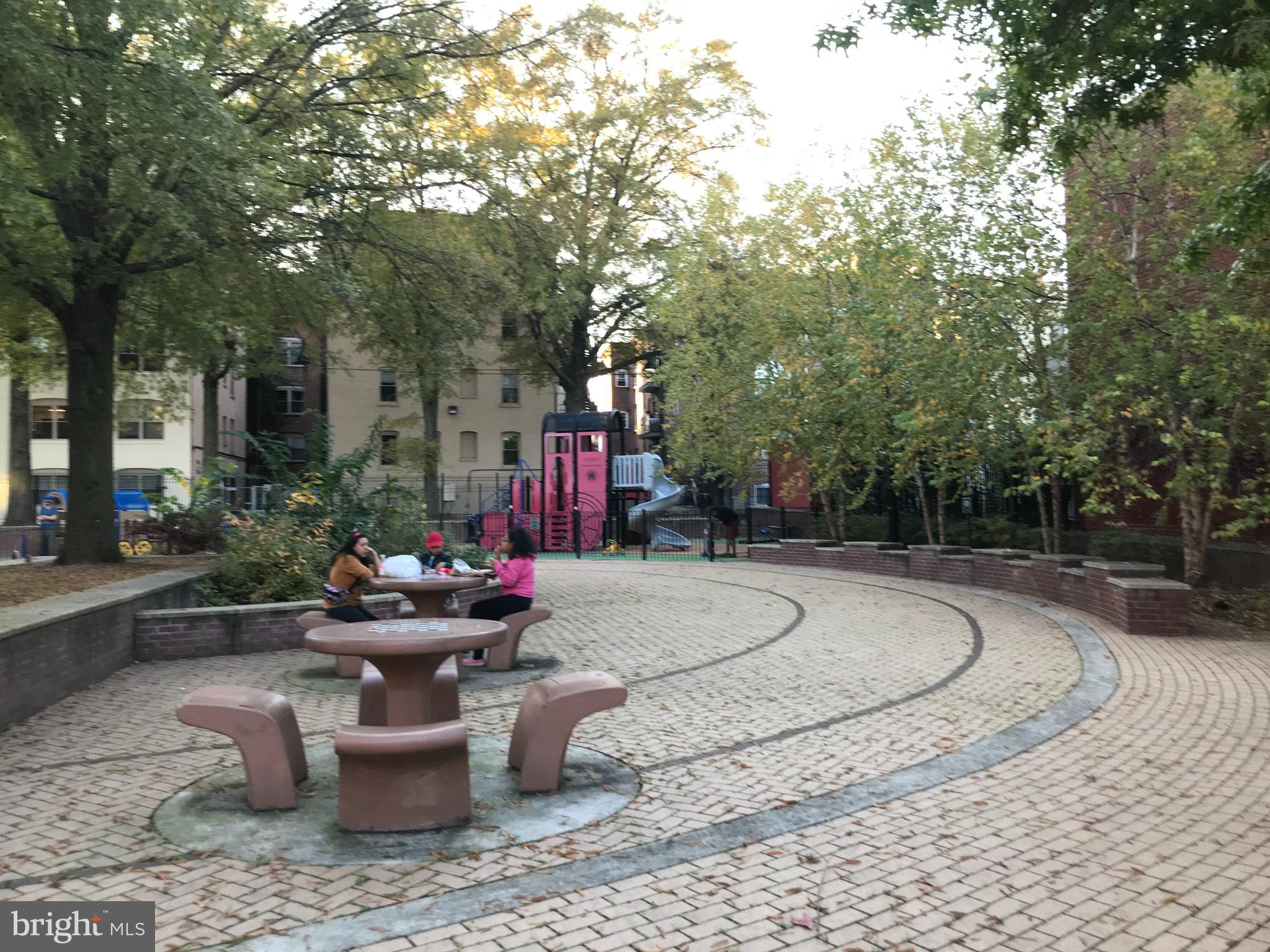 1033 Park Road Northwest, Unit 6 Washington, DC 20010 - Photo 35 of 38 a view of a backyard with sitting area and entertaining space