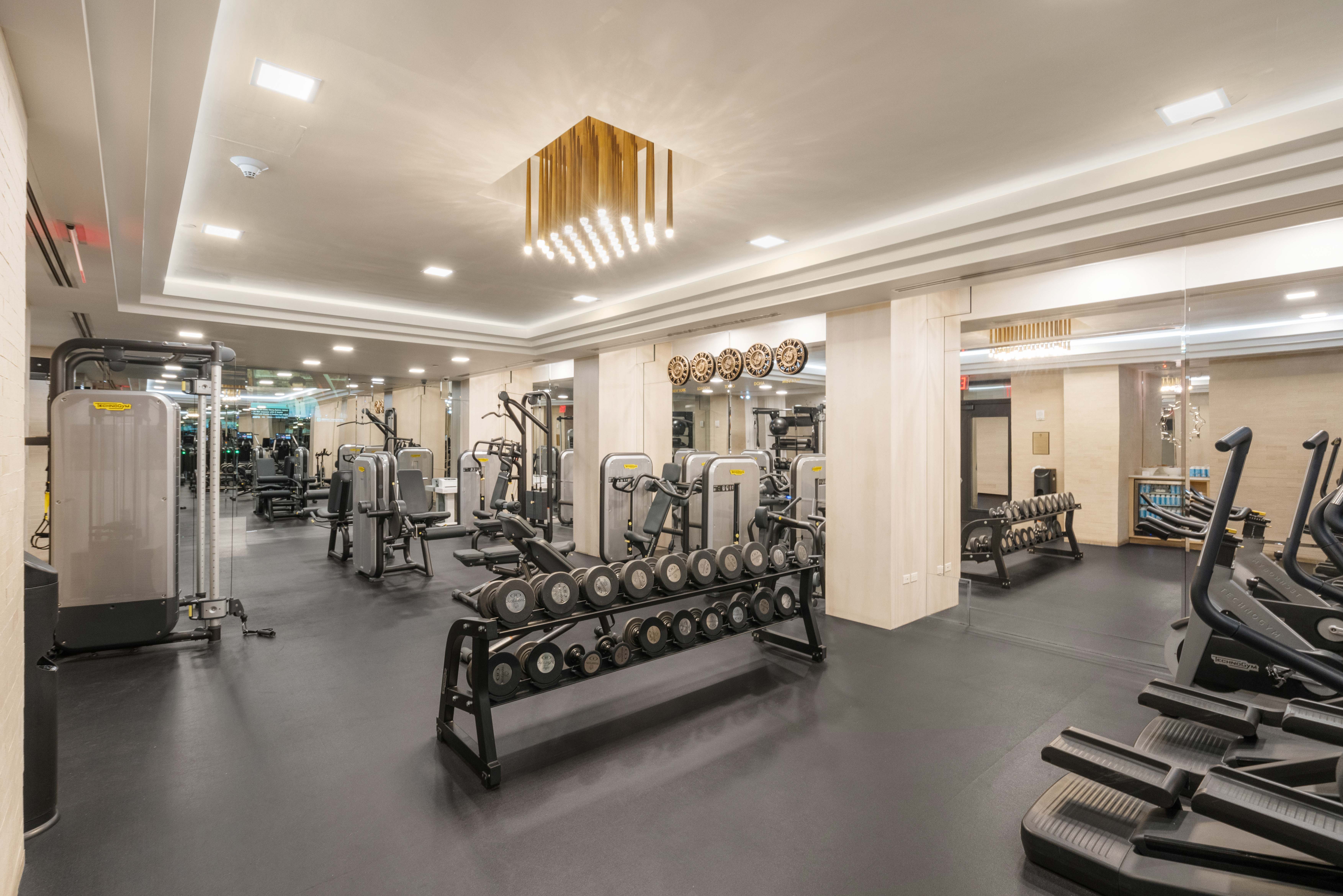1 Central Park South, Unit 1126 Manhattan, NY 10019 - Photo 13 of 19 a view of a room with gym equipment