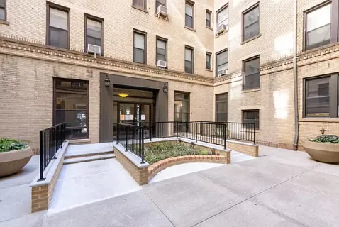 a outdoor view of a building with yard