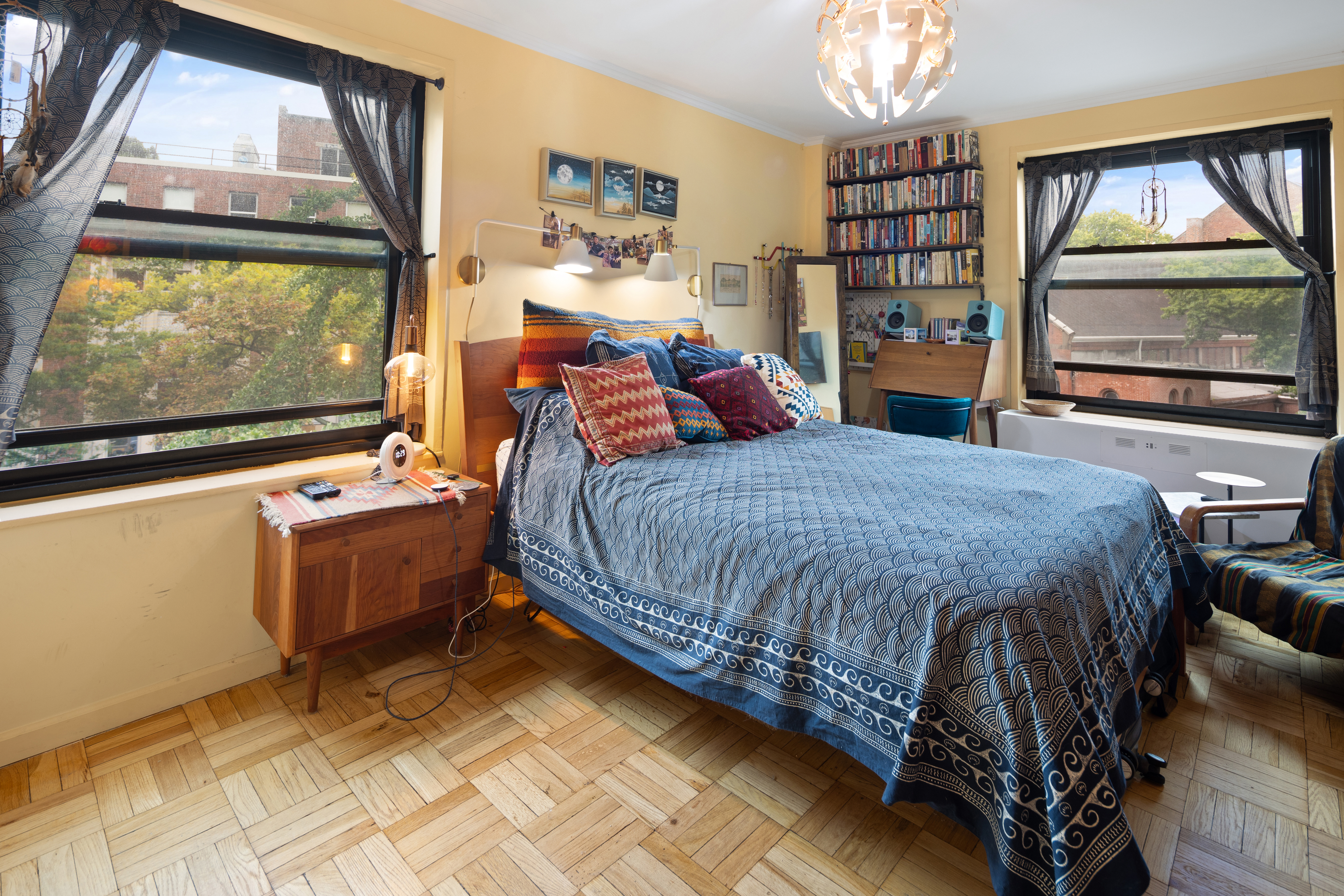 210 Clinton Avenue, Unit 4B Brooklyn, NY 11205 - Photo 3 of 8 a bedroom with a bed and large window