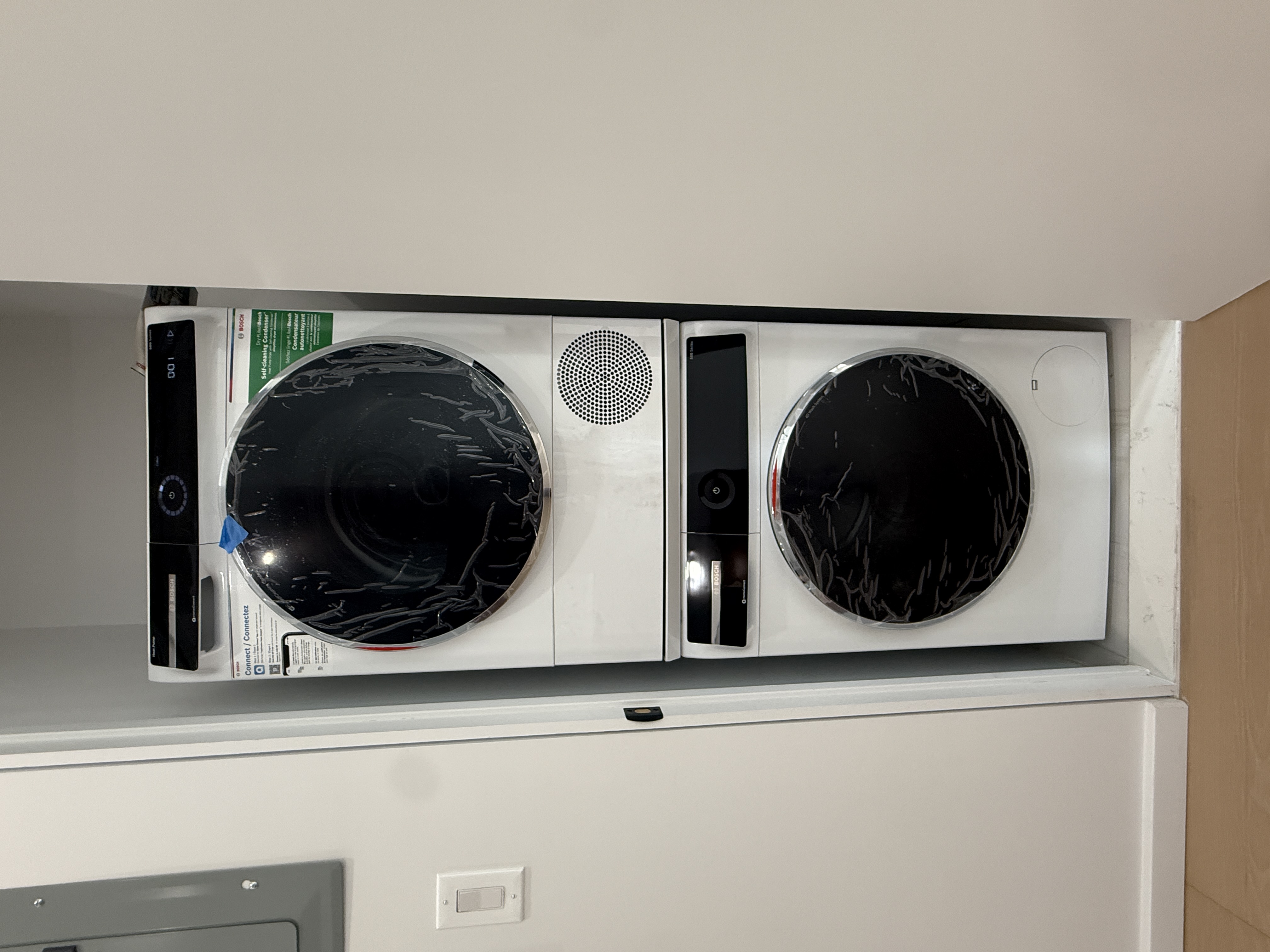 31-16 21st Street, Unit 3E Queens, NY 11106 - Photo 9 of 17 a utility room with dryer and washer