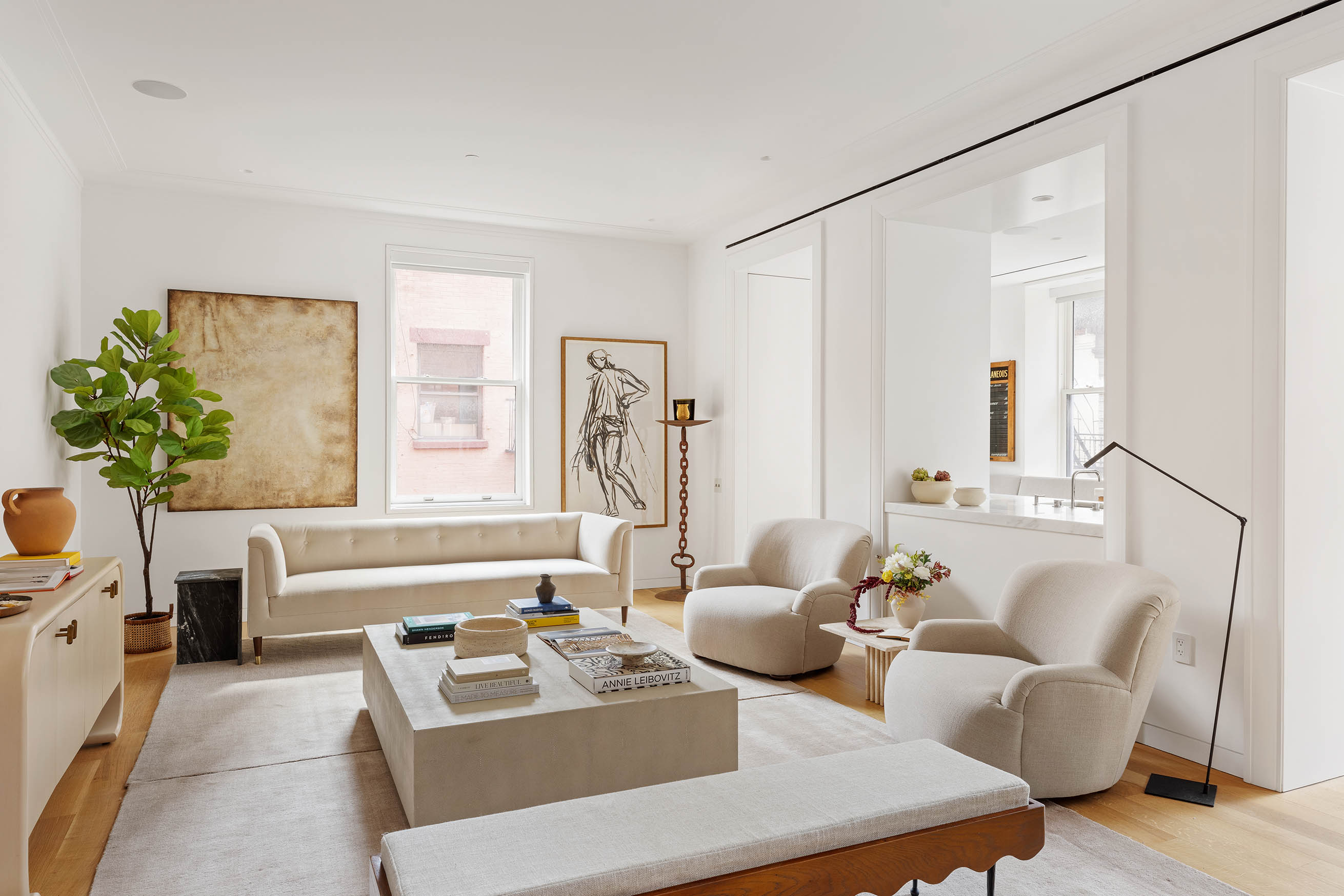 7 Harrison Street, Unit 5S Manhattan, NY 10013 - Photo 6 of 21 a living room with furniture and a potted plant