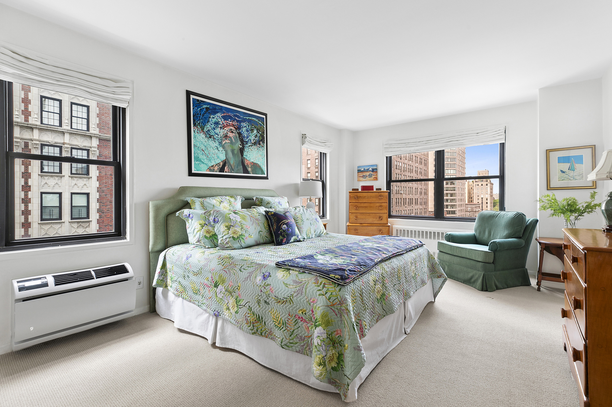 1199 Park Avenue, Unit 10K Manhattan, NY 10128 - Photo 6 of 12 a bedroom with a bed couch and a window