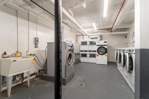 a view of a storage & utility room with washer and dryer