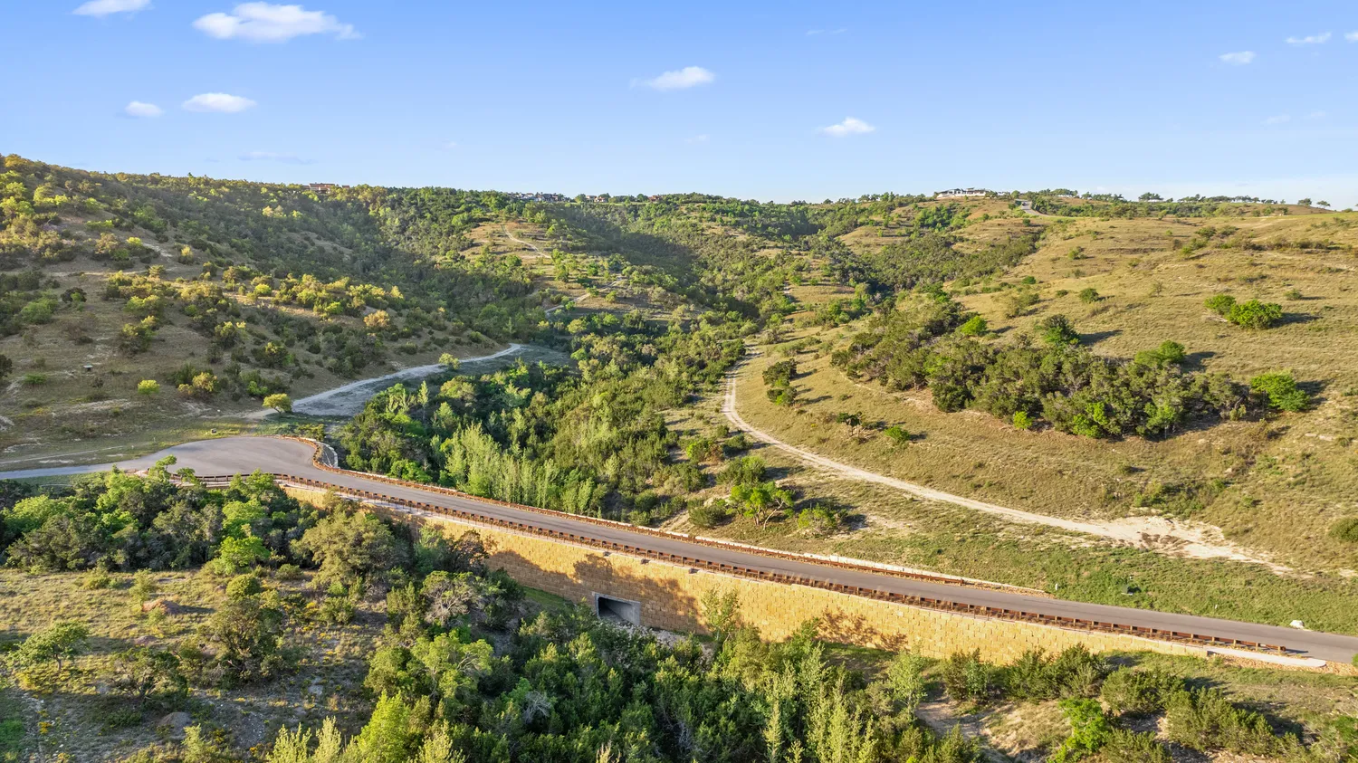 a view of a large body of water with a building in the background
