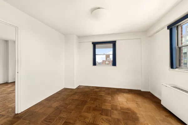 a view of empty room with windows