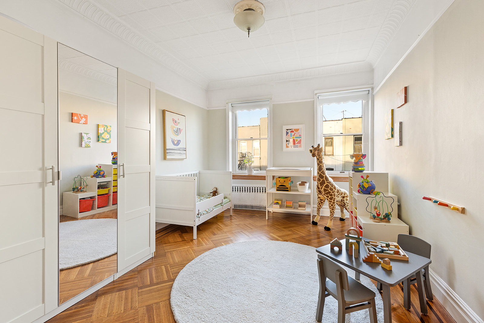 521 84th Street Brooklyn, NY 11209 - Photo 9 of 19 a living room with furniture and a wooden floor