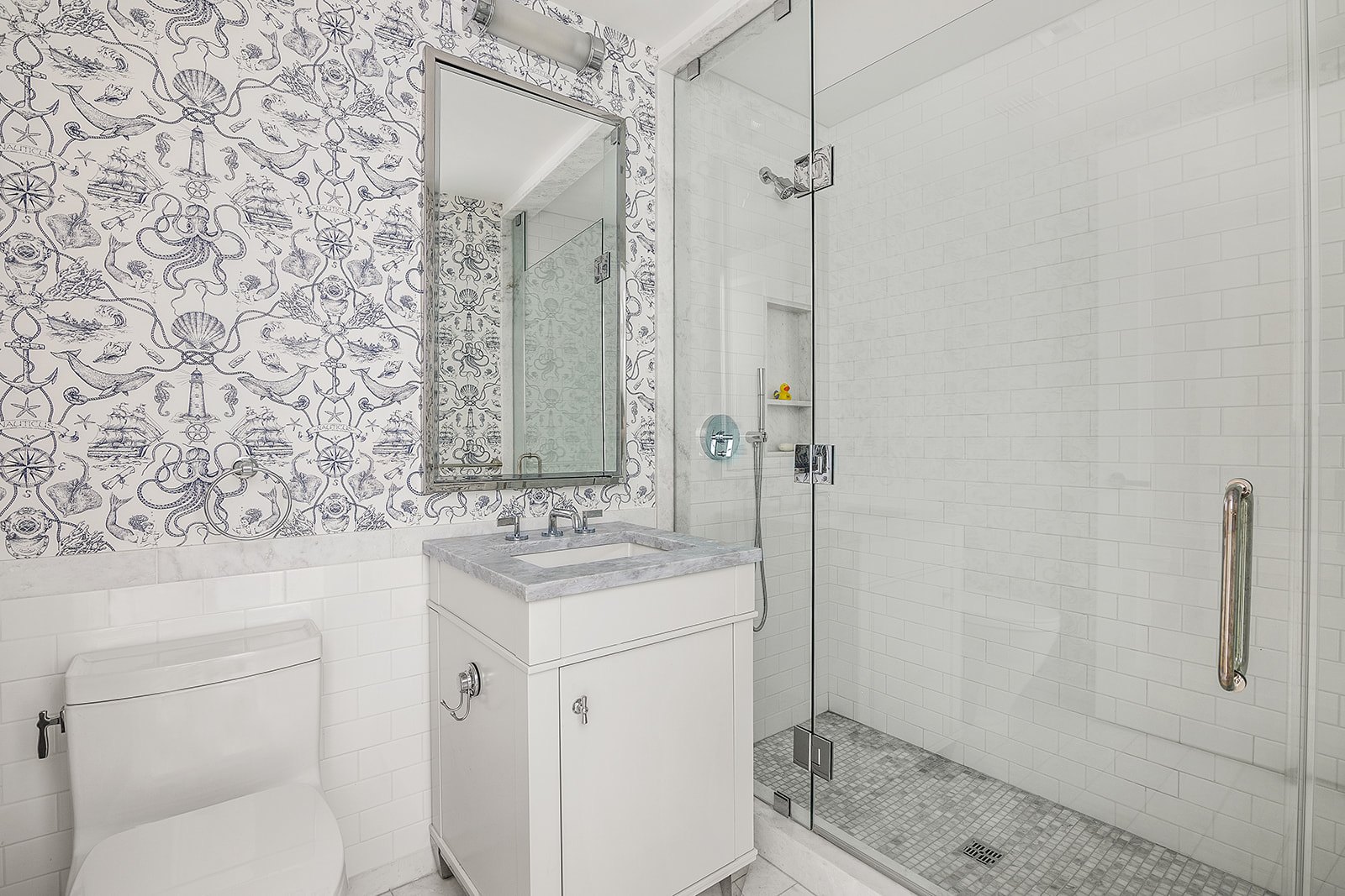 250 West 81st Street, Unit 4A Manhattan, NY 10024 - Photo 10 of 26 a bathroom with a granite countertop sink a toilet and shower