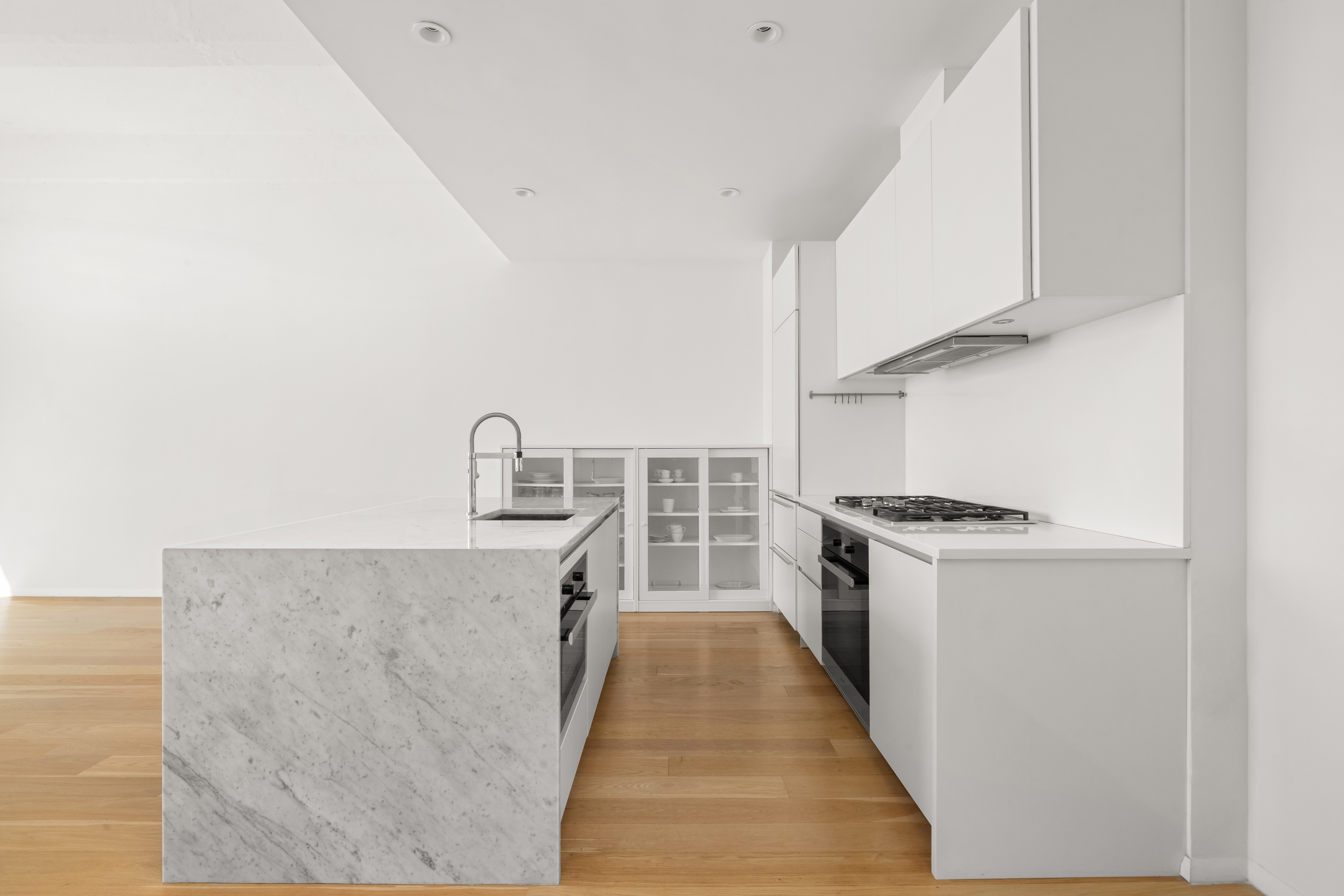 160 Imlay Street, Unit 5A2 Brooklyn, NY 11231 - Photo 4 of 14 a kitchen with granite countertop a stove and a refrigerator