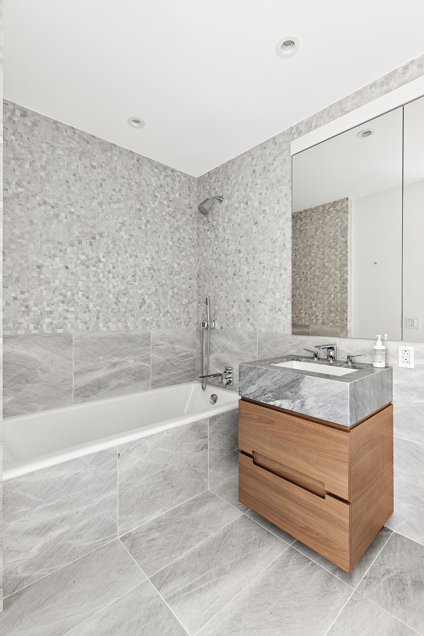 30 Riverside Boulevard, Unit 32G Manhattan, NY 10069 - Photo 8 of 9 a bathroom with a bathtub and a sink