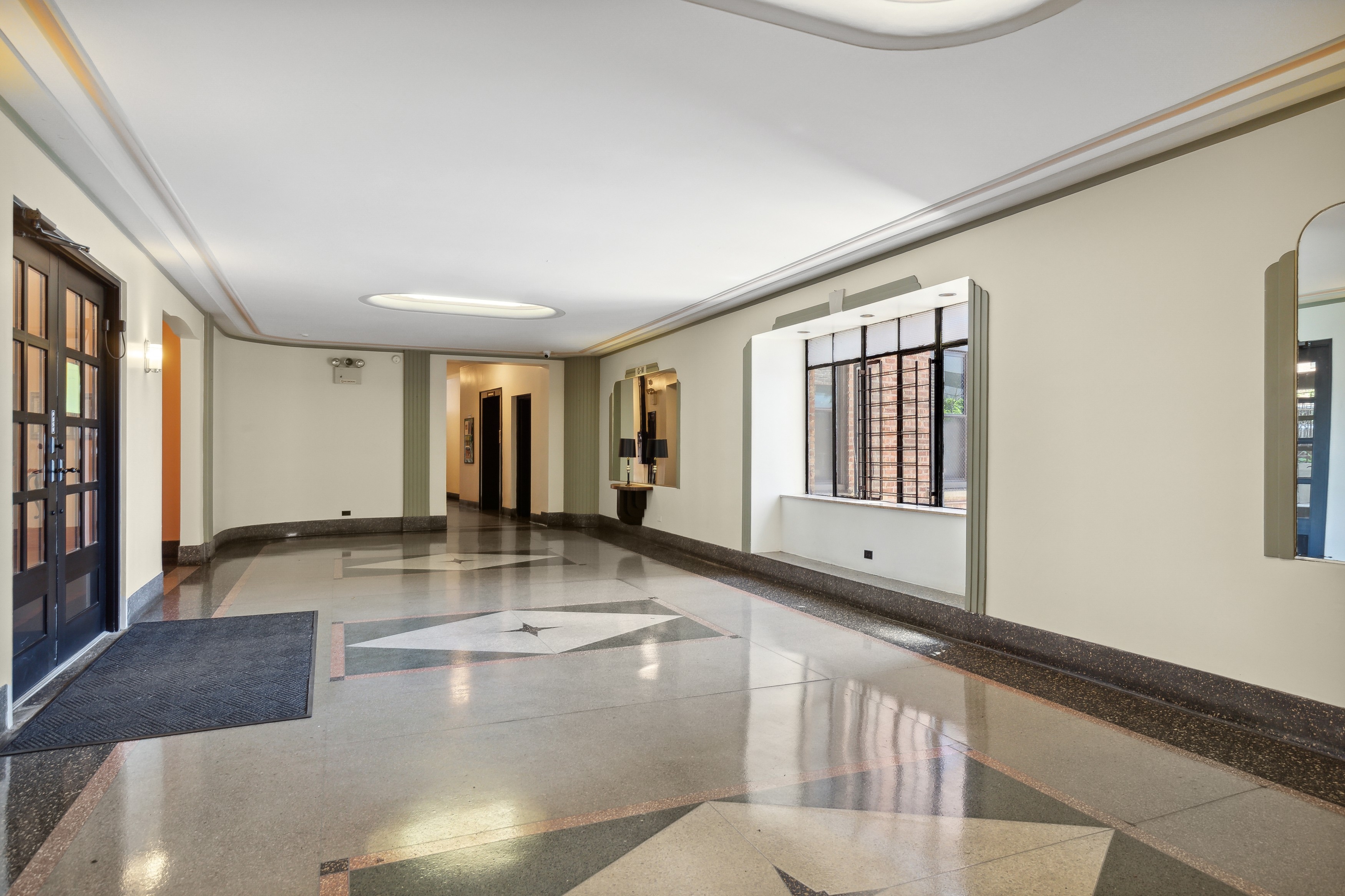 50 Park Terrace East, Unit 7E Manhattan, NY 10034 - Photo 10 of 19 a view of an entryway with wooden floor