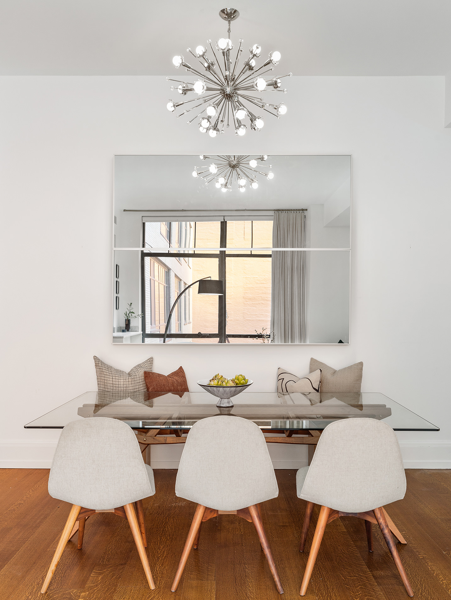 10 Madison Square West, Unit 7A Manhattan, NY 10010 - Photo 5 of 8 a view of a dining room with furniture and a chandelier