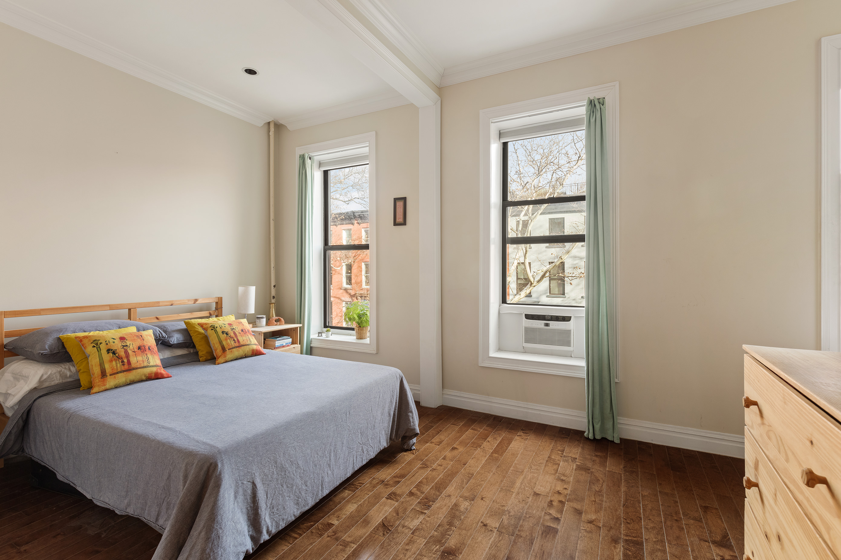 396 Degraw Street, Unit 2 Brooklyn, NY 11231 - Photo 3 of 5 a bedroom with a bed and wooden floor