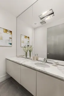 a bedroom with furniture and windows