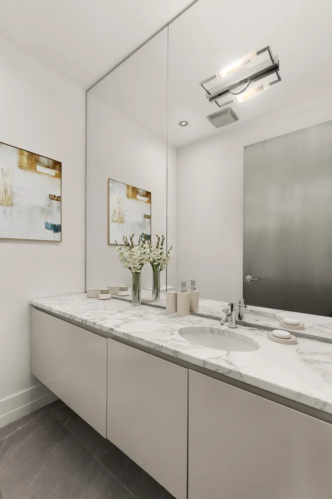 a bedroom with furniture and windows