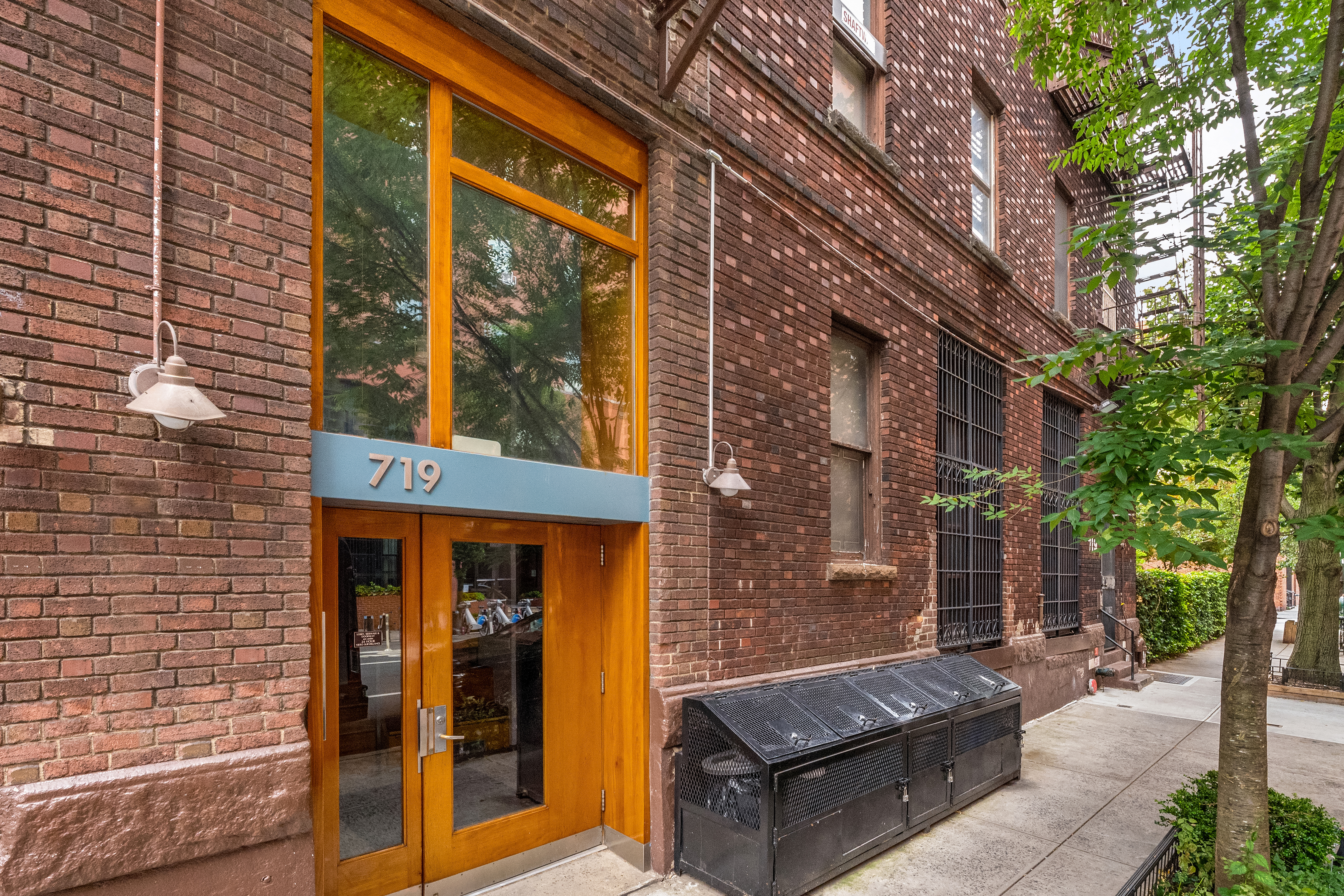719 Greenwich Street, Unit 3S Manhattan, NY 10014 - Photo 15 of 21 a view of brick house with a large windows