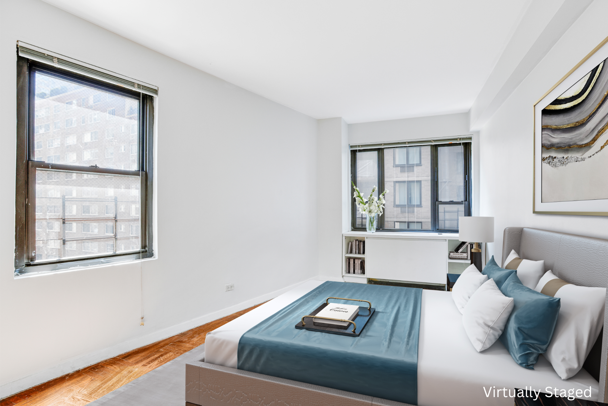 210 East 47th Street, Unit 7J Manhattan, NY 10017 - Photo 3 of 12 a living room with furniture and a window