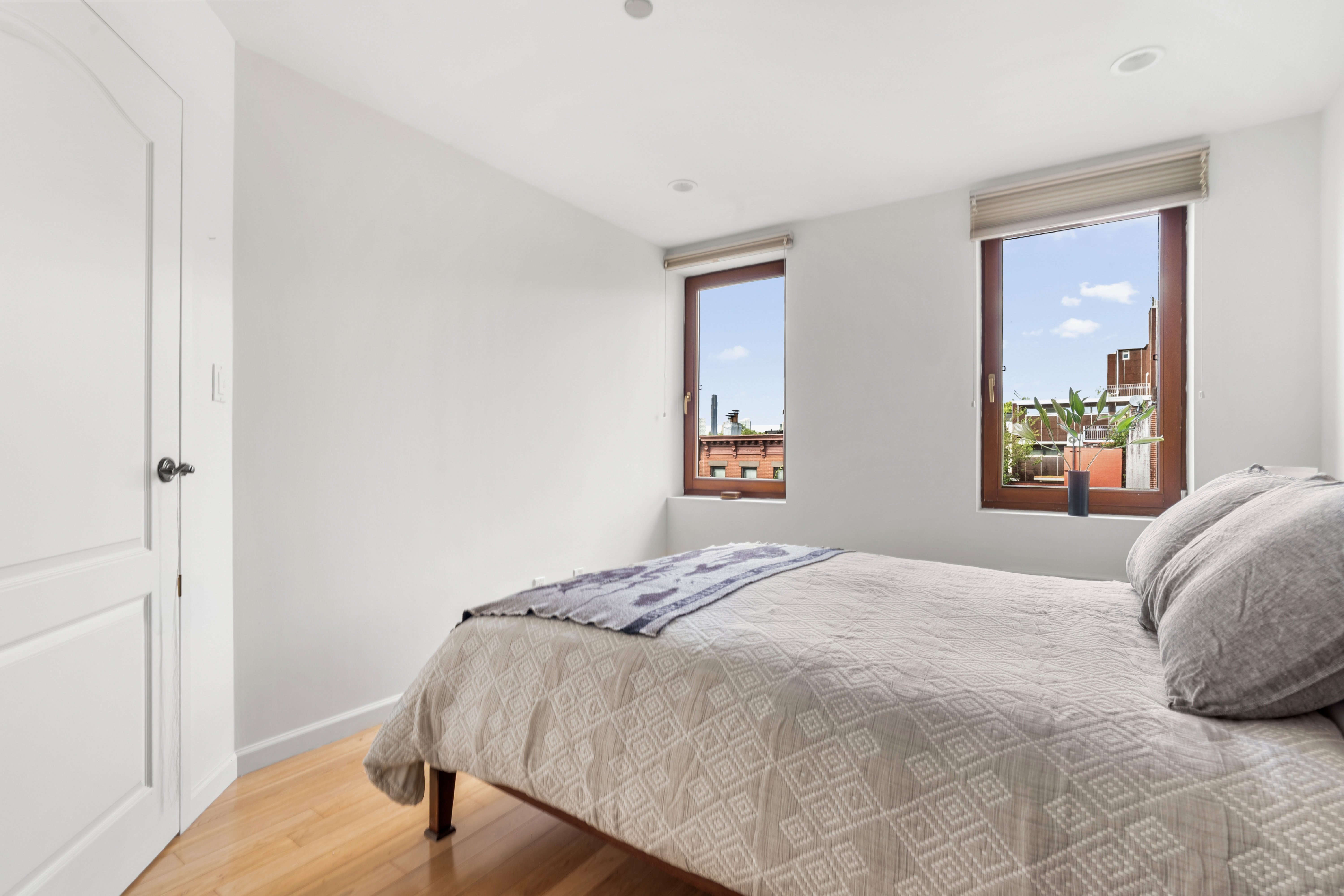 394 12th Street, Unit 5 Brooklyn, NY 11215 - Photo 7 of 14 a bedroom with a bed and a window