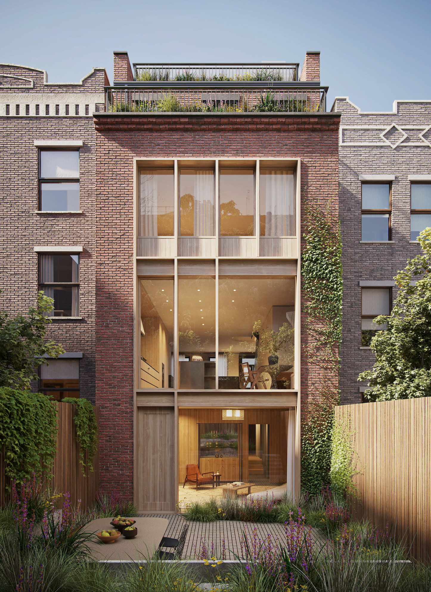 244 West 11th Street Manhattan, NY 10014 - Photo 16 of 29 a front view of a building with a garden and plants