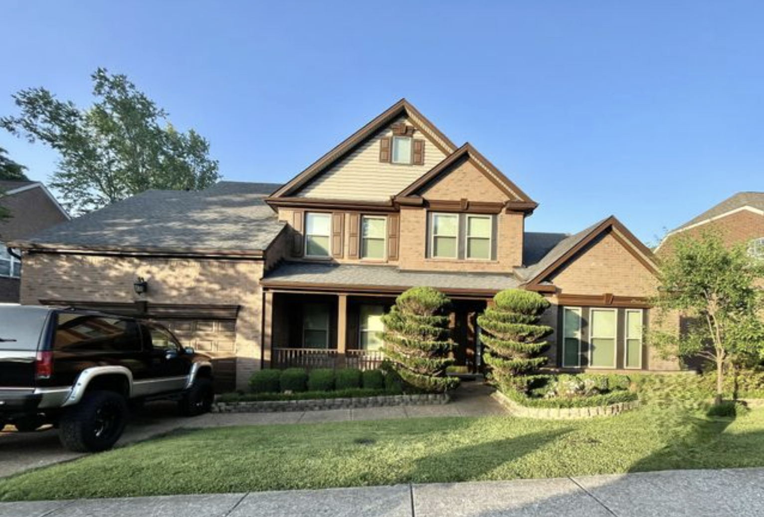 416 MacKenzie Way Franklin, TN 37064 - Photo 1 of 1 a front view of a house with garden