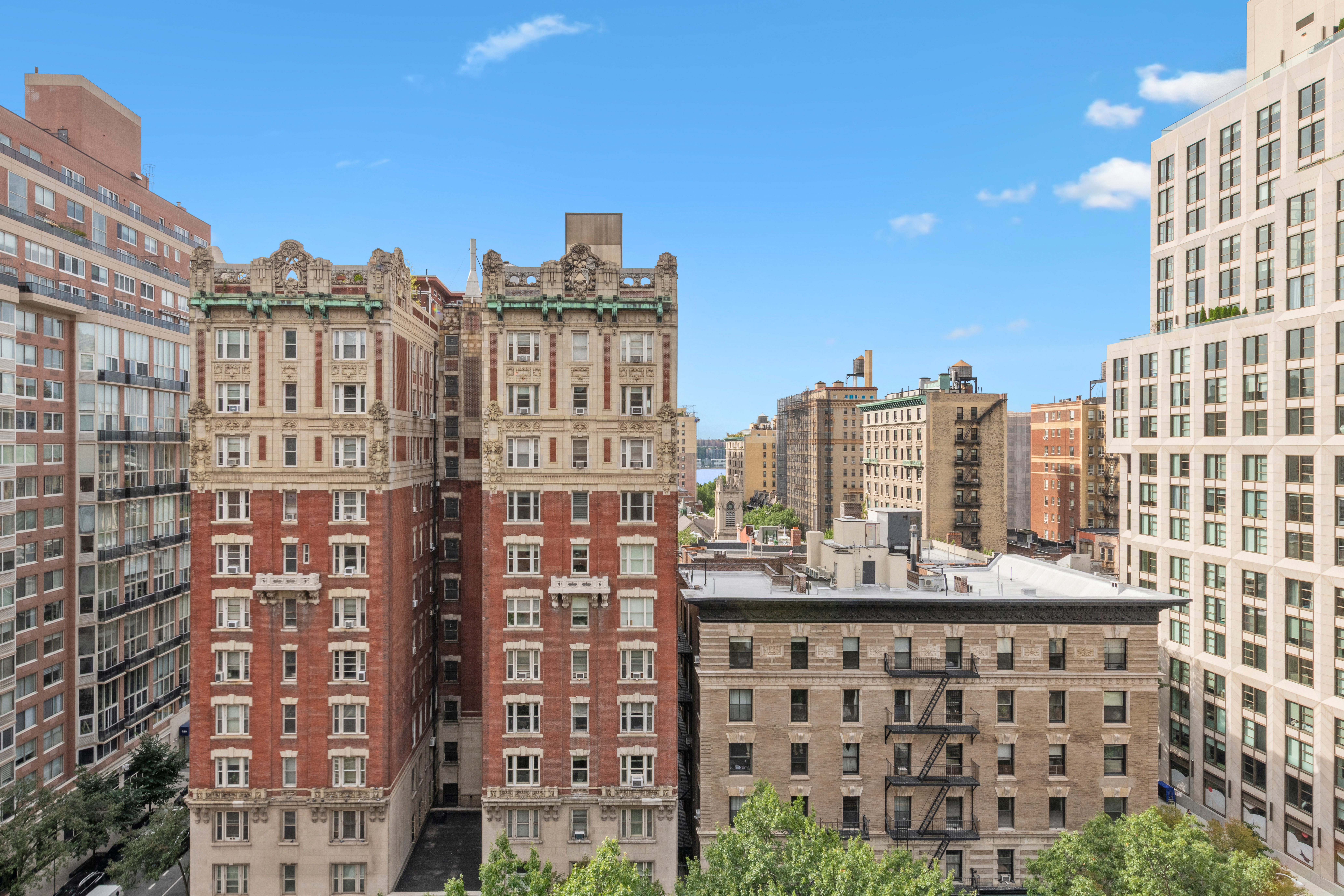215 West 90th Street, Unit 10A Manhattan, NY 10024 - Photo 13 of 14 a view of a building with glass windows