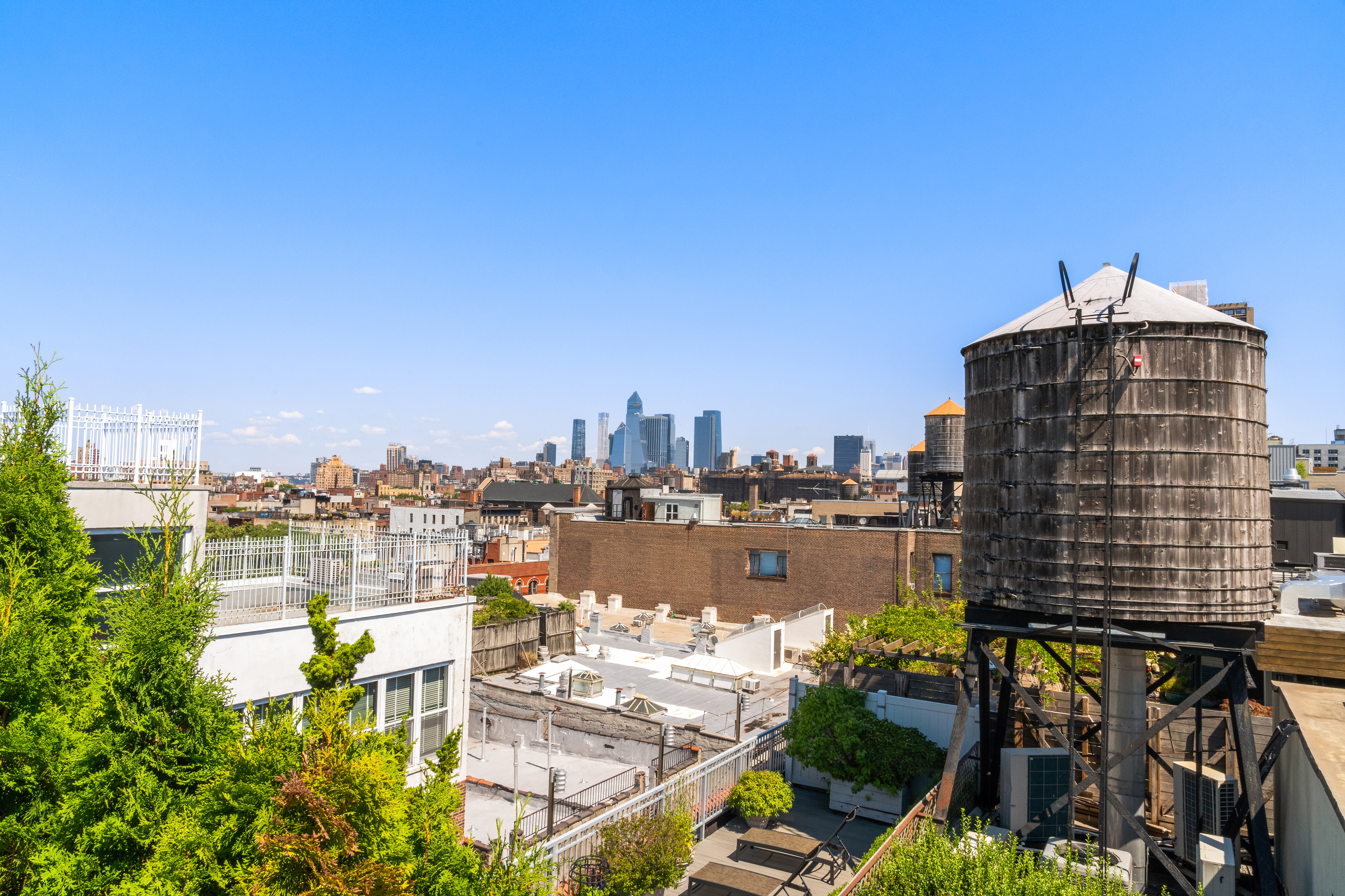 101 Wooster Street, Unit 3/4F Manhattan, NY 10012 - Photo 14 of 16 a view of a city with tall buildings