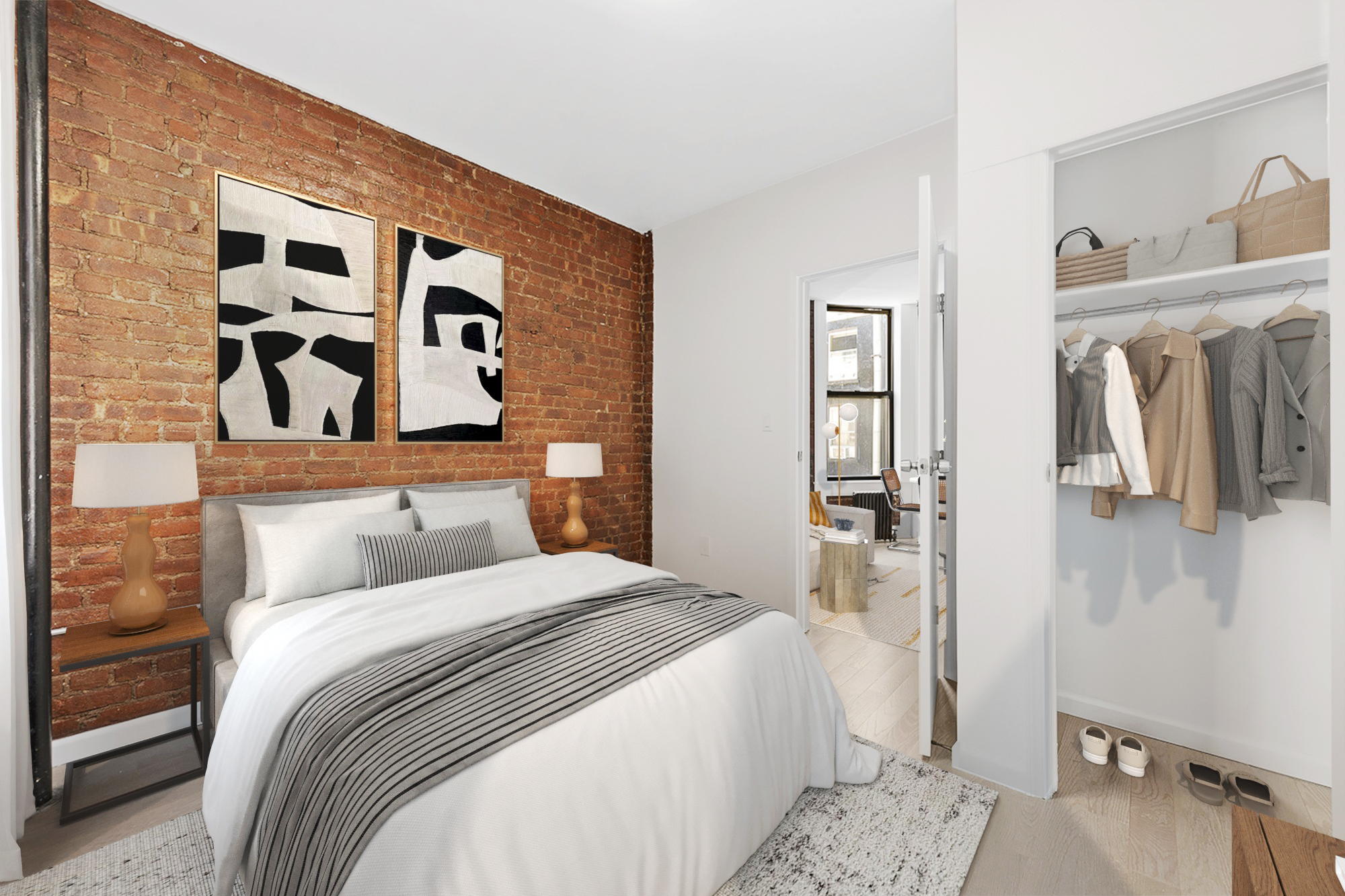 117 Mulberry Street, Unit 9 Manhattan, NY 10013 - Photo 2 of 5 a bedroom with a bed and a painting on the wall