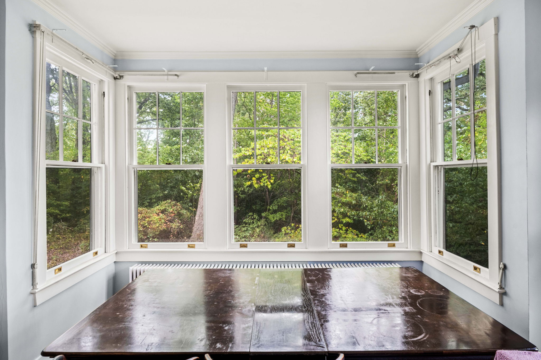 3104 Russell Road Alexandria, VA 22305 - Photo 12 of 62 a view of an empty room with wooden floor and a window