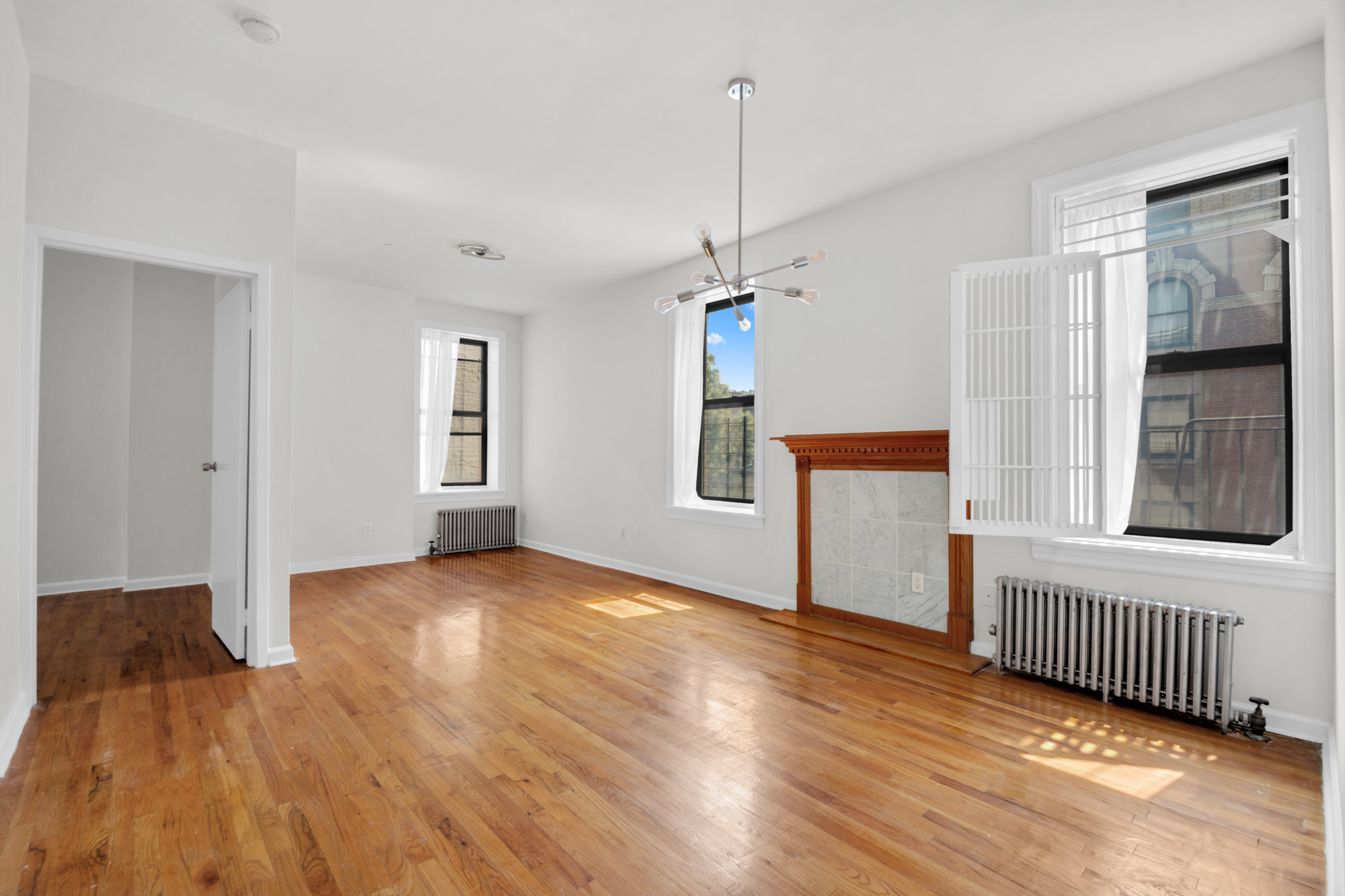469 West 166th Street, Unit 4C Manhattan, NY 10032 - Photo 2 of 12 a view of an empty room with a window