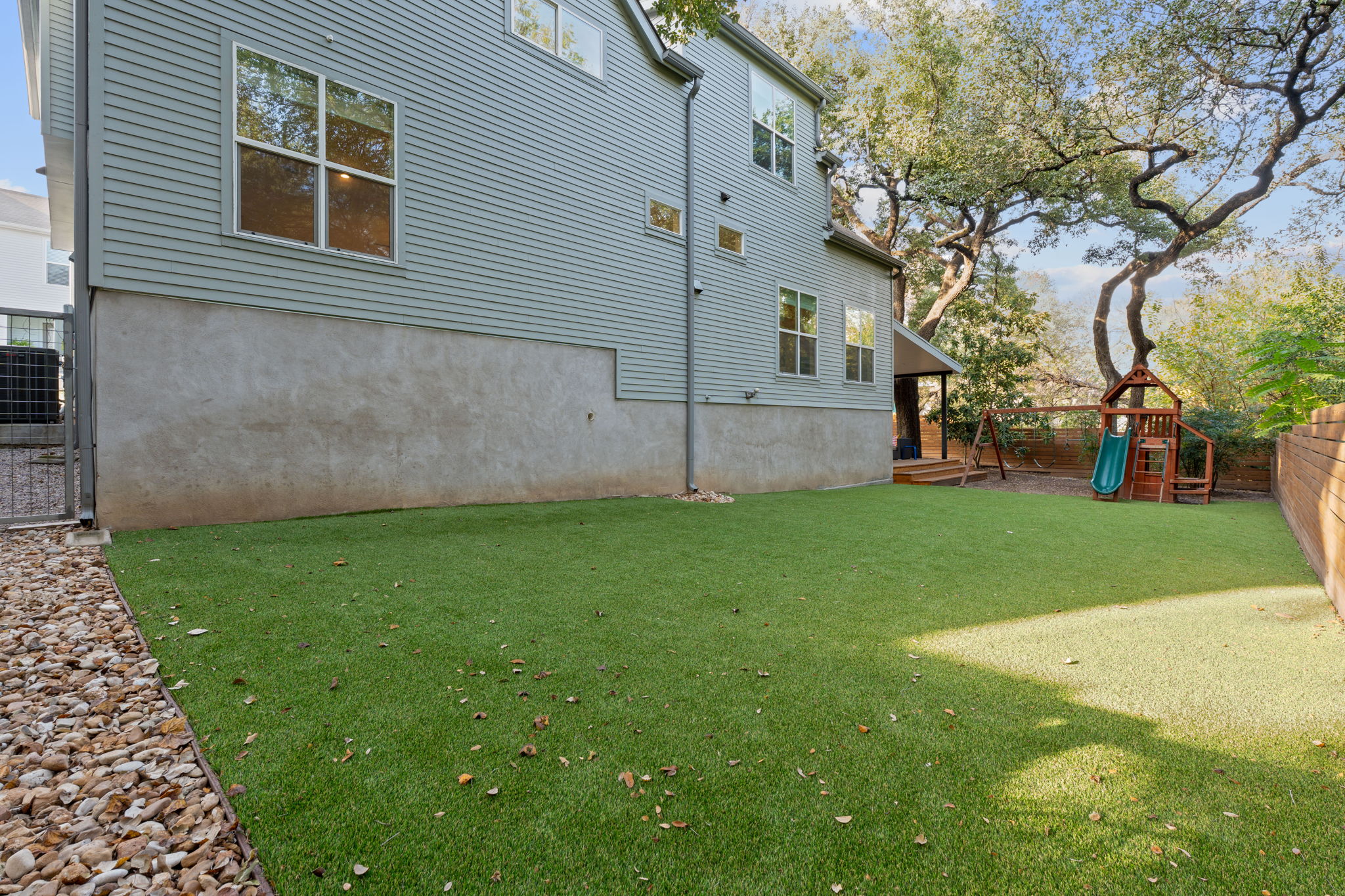 3001 Del Curto Road, Unit 10 Austin, TX 78704 - Photo 32 of 44 a view of a backyard with large trees