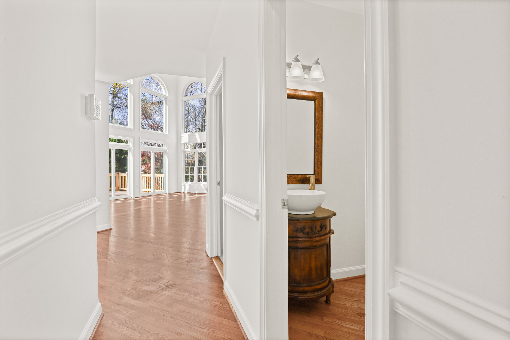 2628 Five Oaks Road Vienna, VA 22181 - Photo 8 of 40 a view of a hallway with wooden floor and closet