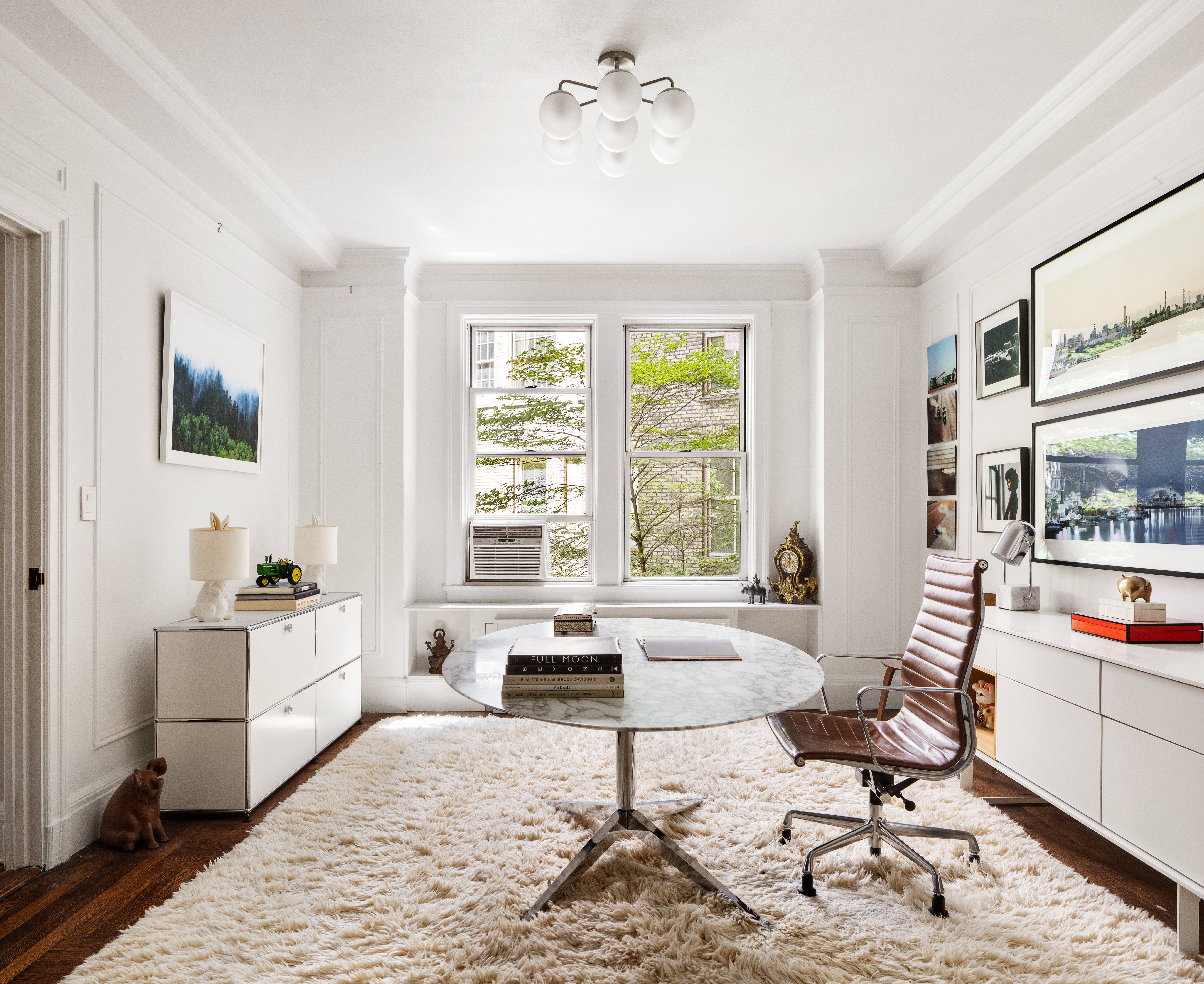 173-175 Riverside Drive, Unit 2L Manhattan, NY 10024 - Photo 3 of 18 a living room with furniture and a large window