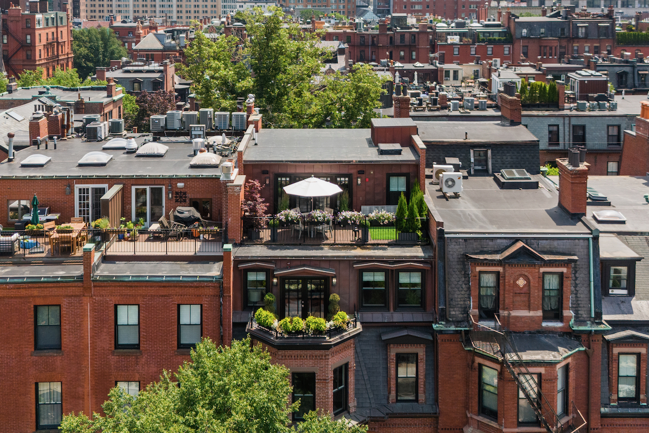361 Beacon Street, Unit PH Boston, MA 02116 - Photo 2 of 9 a view of a water fountain in the middle of a city